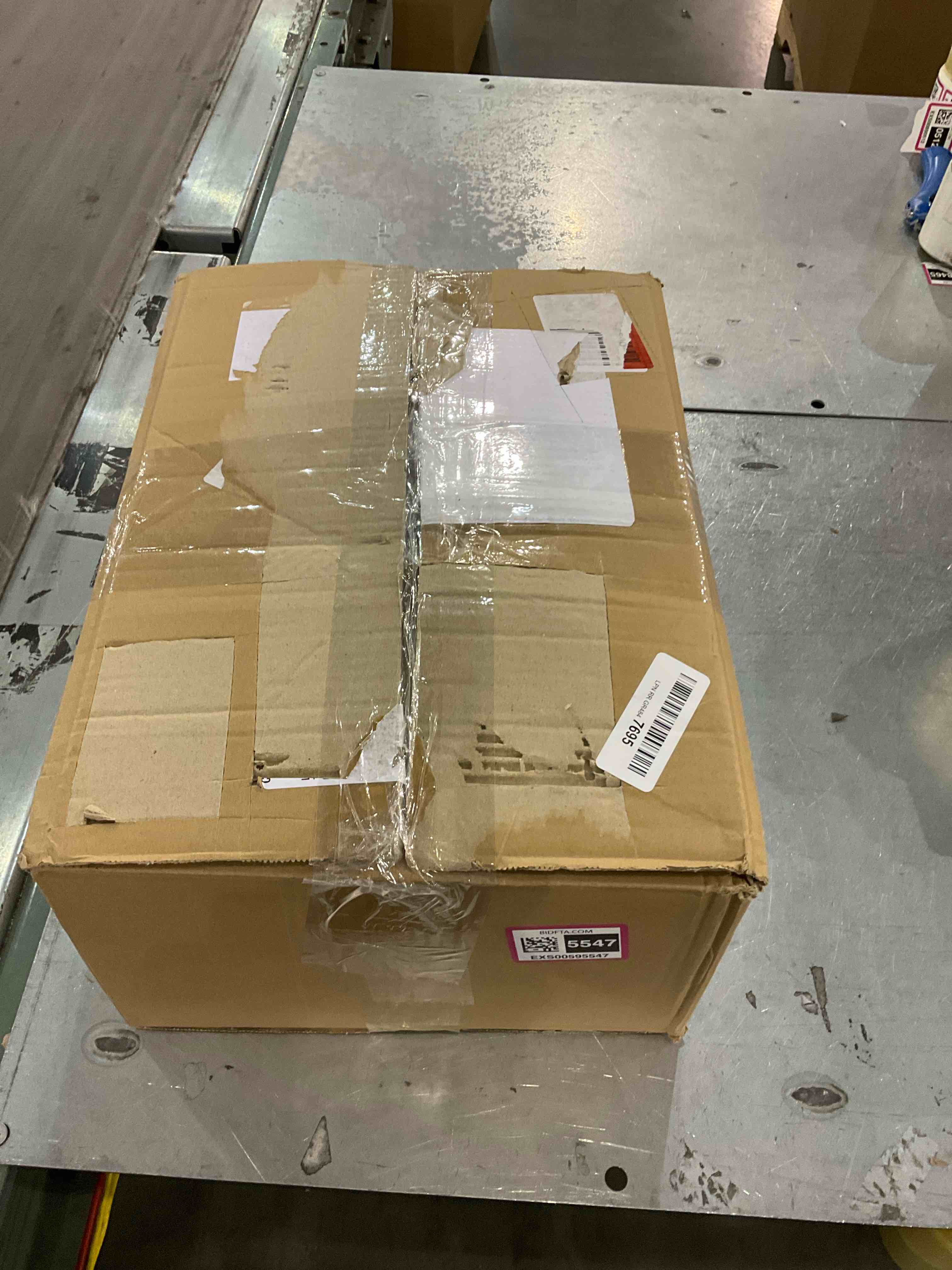 https://s3.amazonaws.com/lotting-images-prod/bidfta/EXS00595547_1699620156640.jpeg