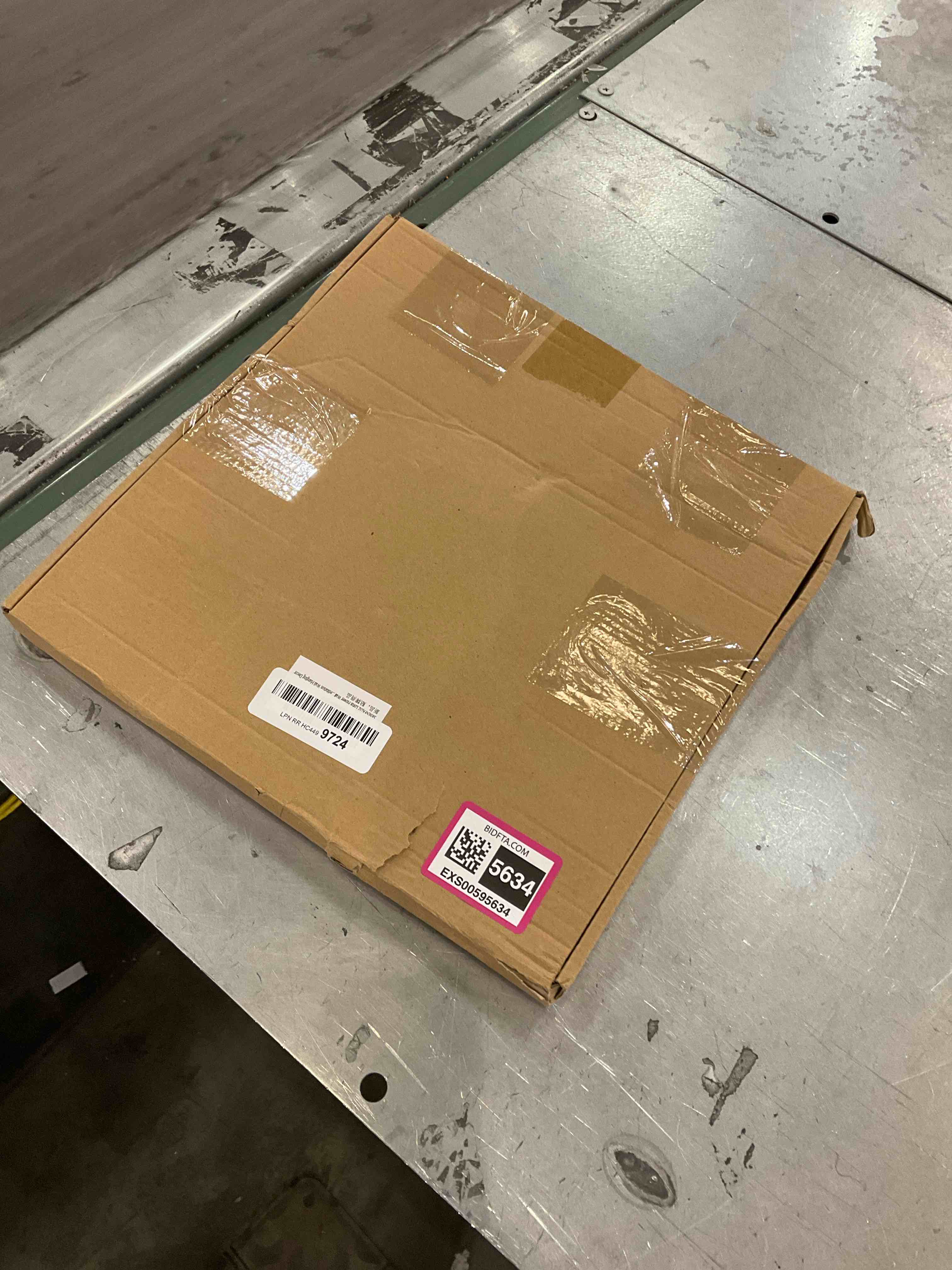 https://s3.amazonaws.com/lotting-images-prod/bidfta/EXS00595634_1699886572715.jpeg
