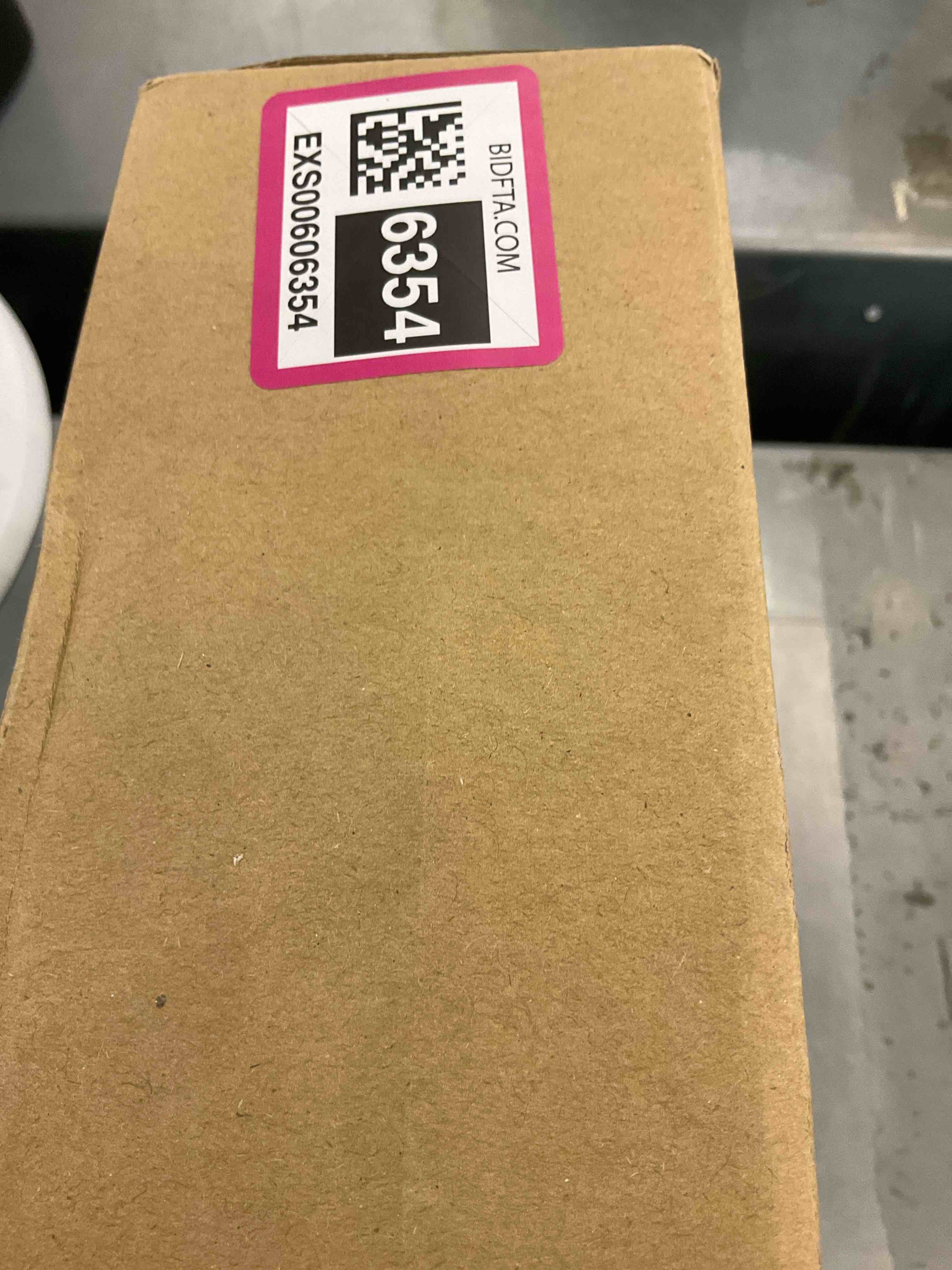 https://s3.amazonaws.com/lotting-images-prod/bidfta/EXS00606354_1698252040453.jpeg