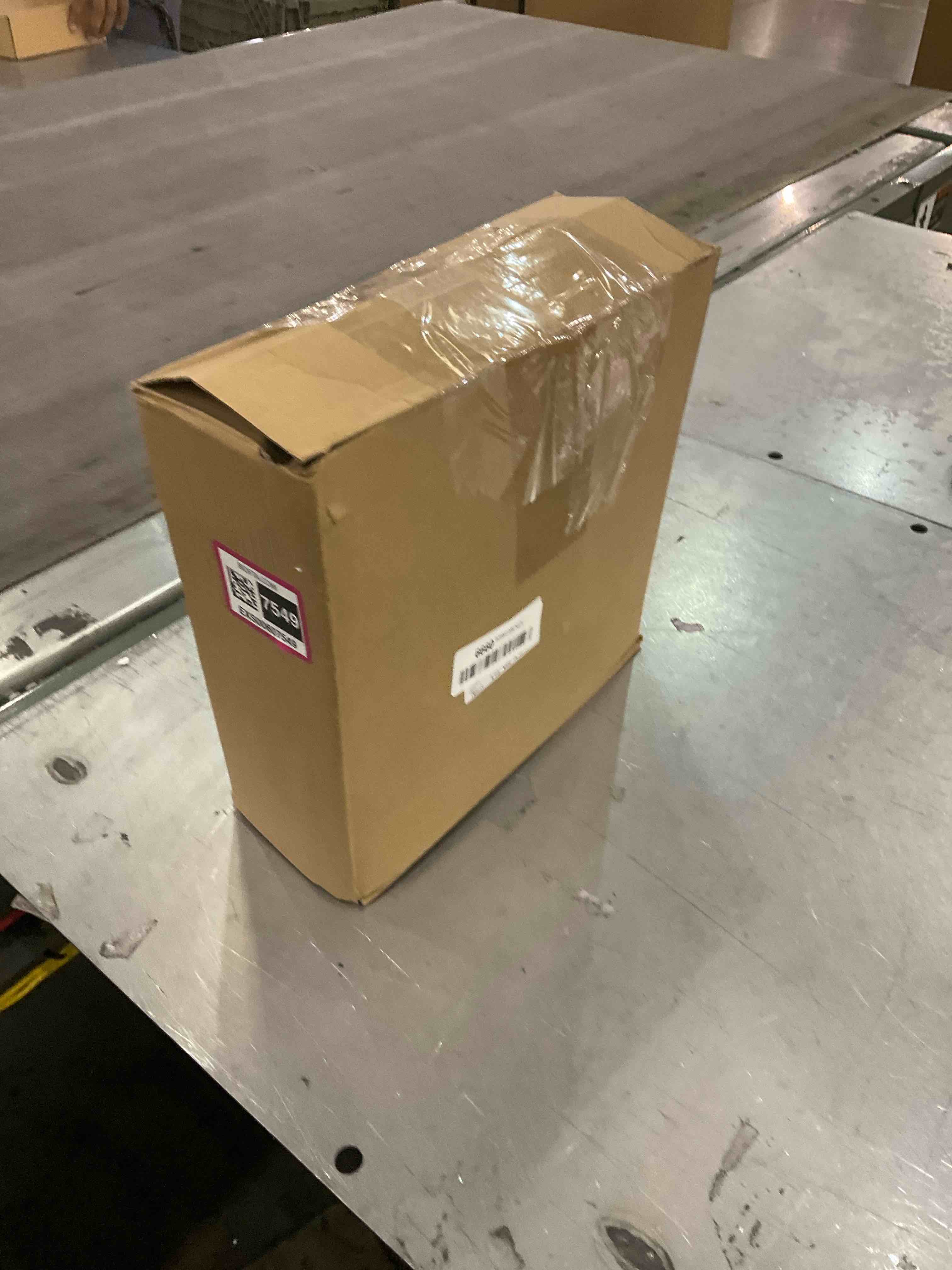https://s3.amazonaws.com/lotting-images-prod/bidfta/EXS00607549_1698240628080.jpeg