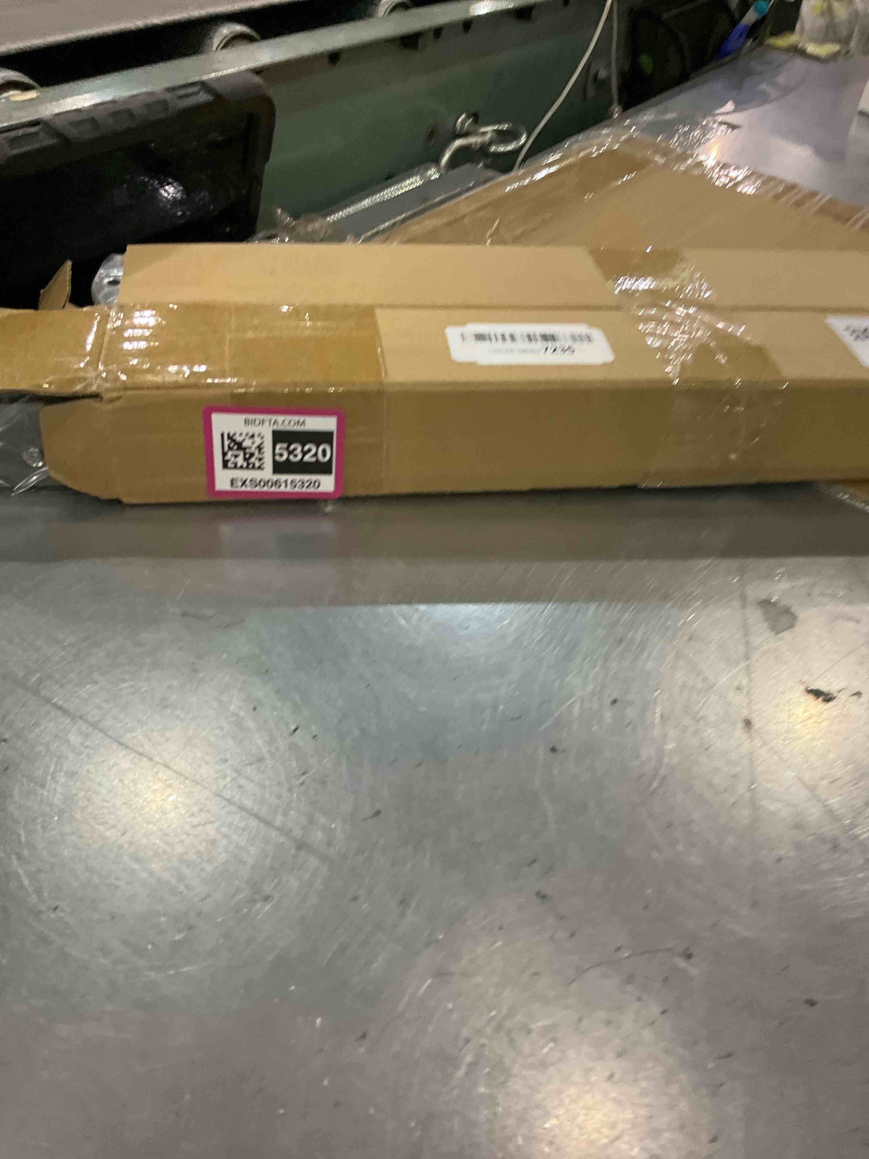 https://s3.amazonaws.com/lotting-images-prod/bidfta/EXS00615320_1698692802266.jpeg