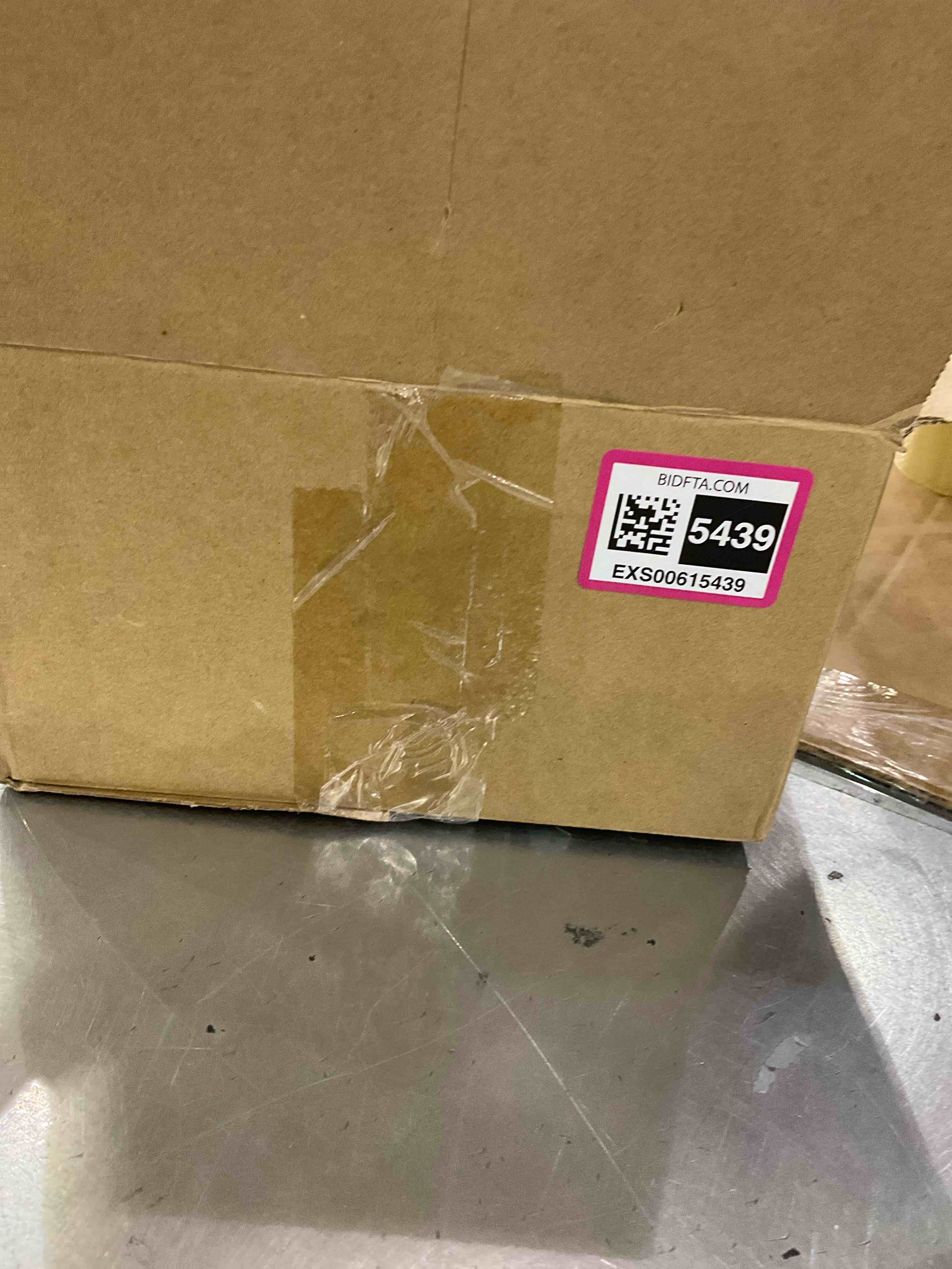 https://s3.amazonaws.com/lotting-images-prod/bidfta/EXS00615439_1698762314579.jpeg
