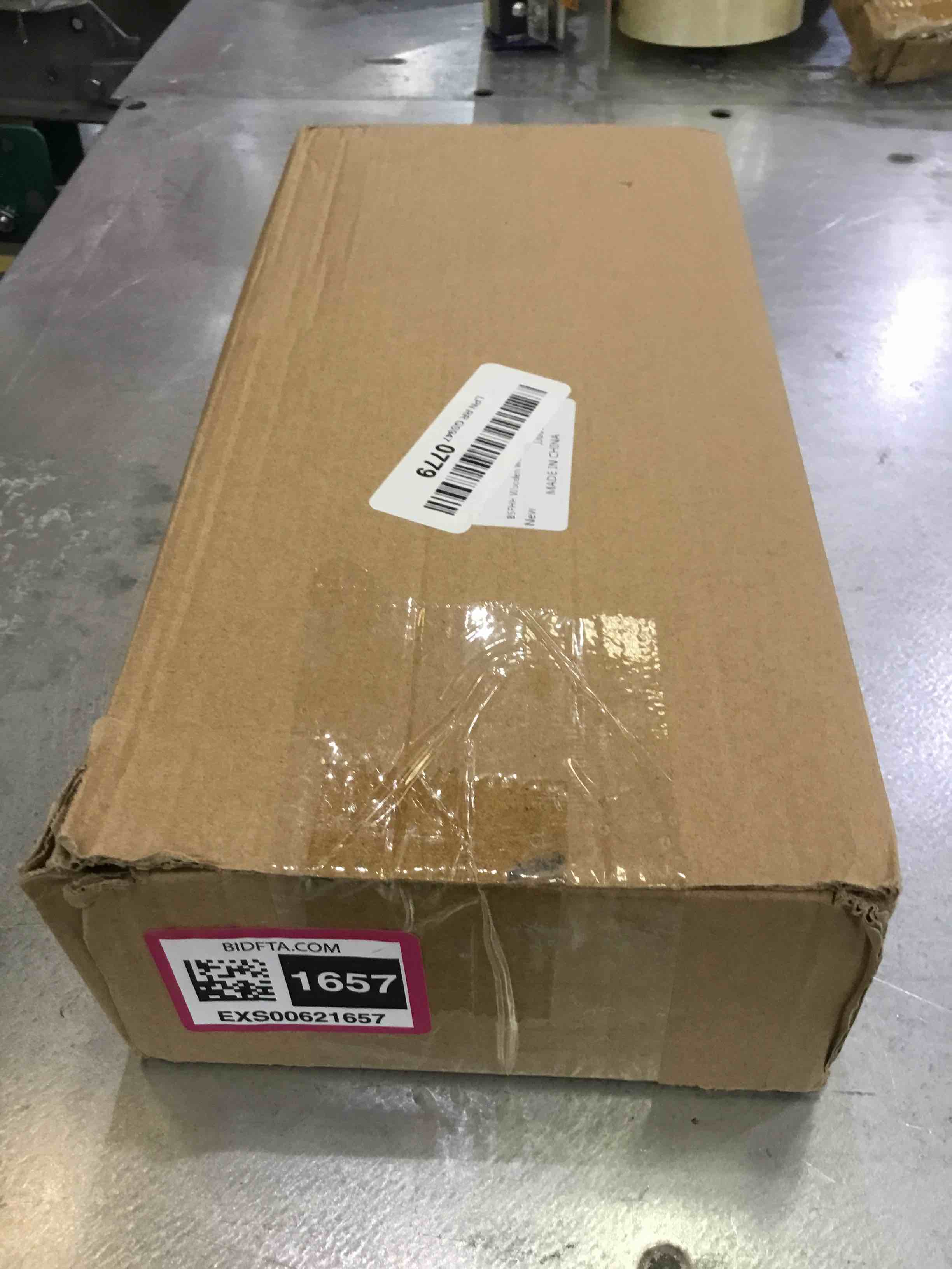 https://s3.amazonaws.com/lotting-images-prod/bidfta/EXS00621657_1696444543949.jpeg