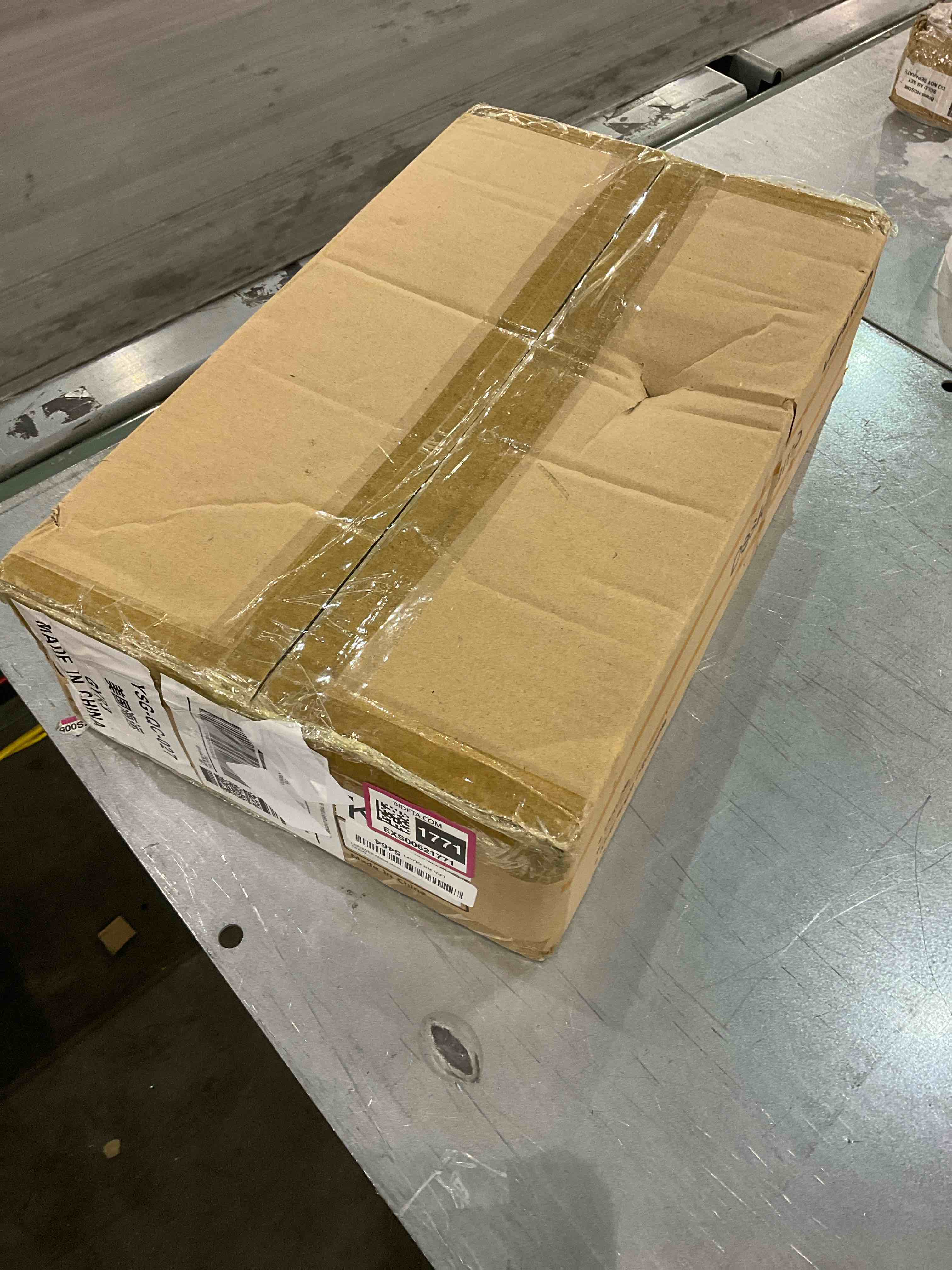 https://s3.amazonaws.com/lotting-images-prod/bidfta/EXS00621771_1696850292145.jpeg