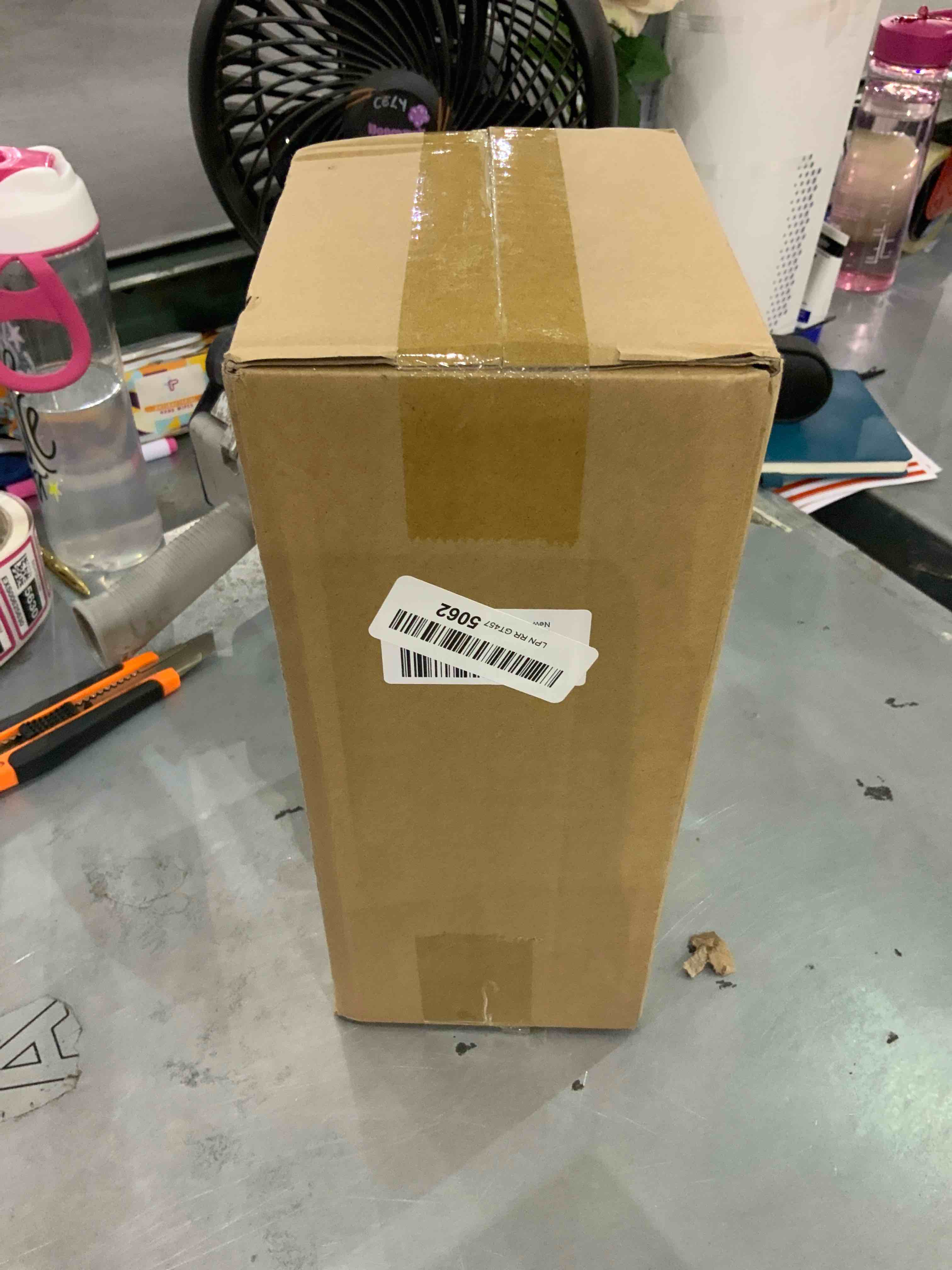 https://s3.amazonaws.com/lotting-images-prod/bidfta/EXS00625629_1695038101356.jpeg