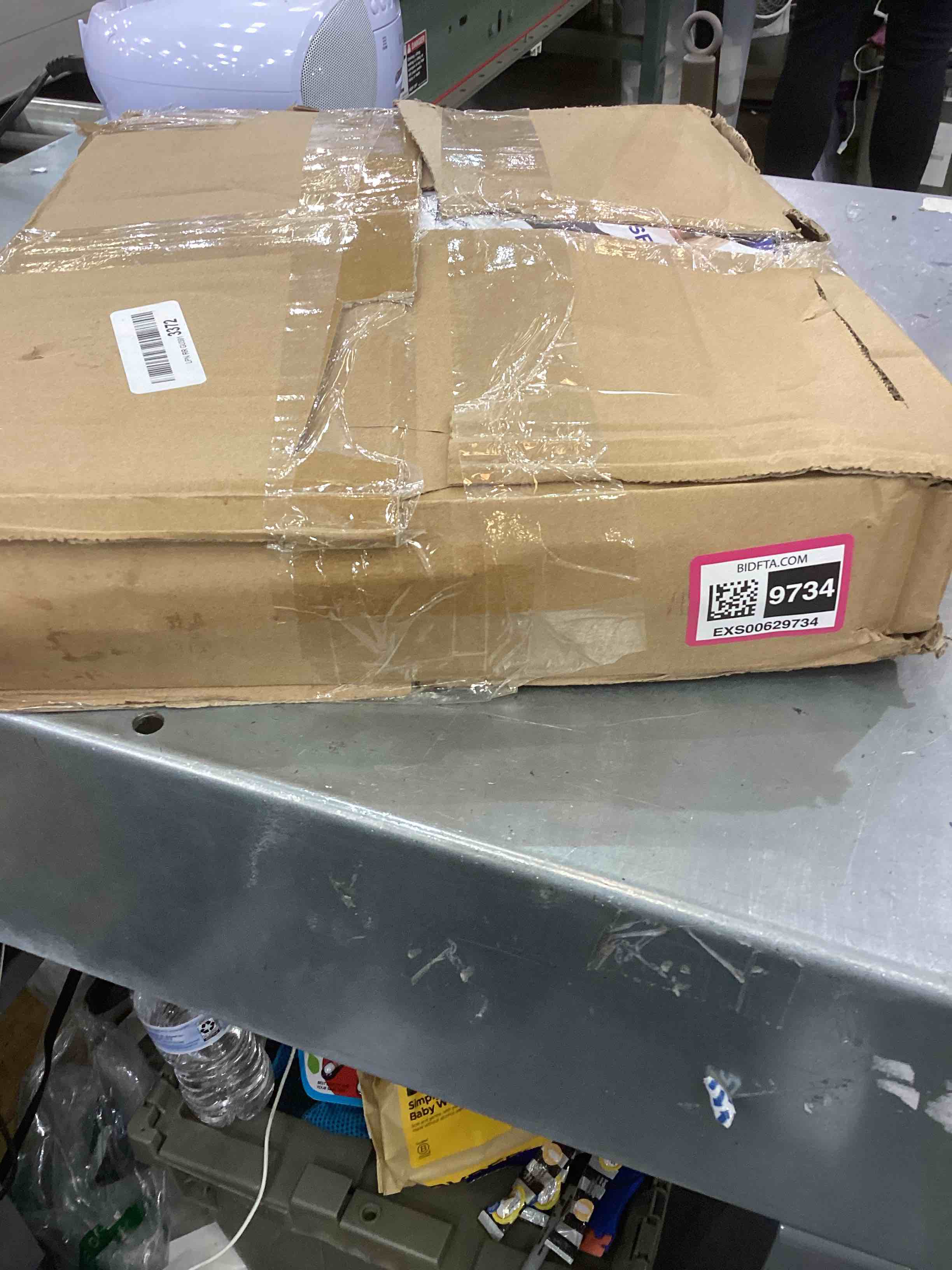 https://s3.amazonaws.com/lotting-images-prod/bidfta/EXS00629734_1695063869271.jpeg