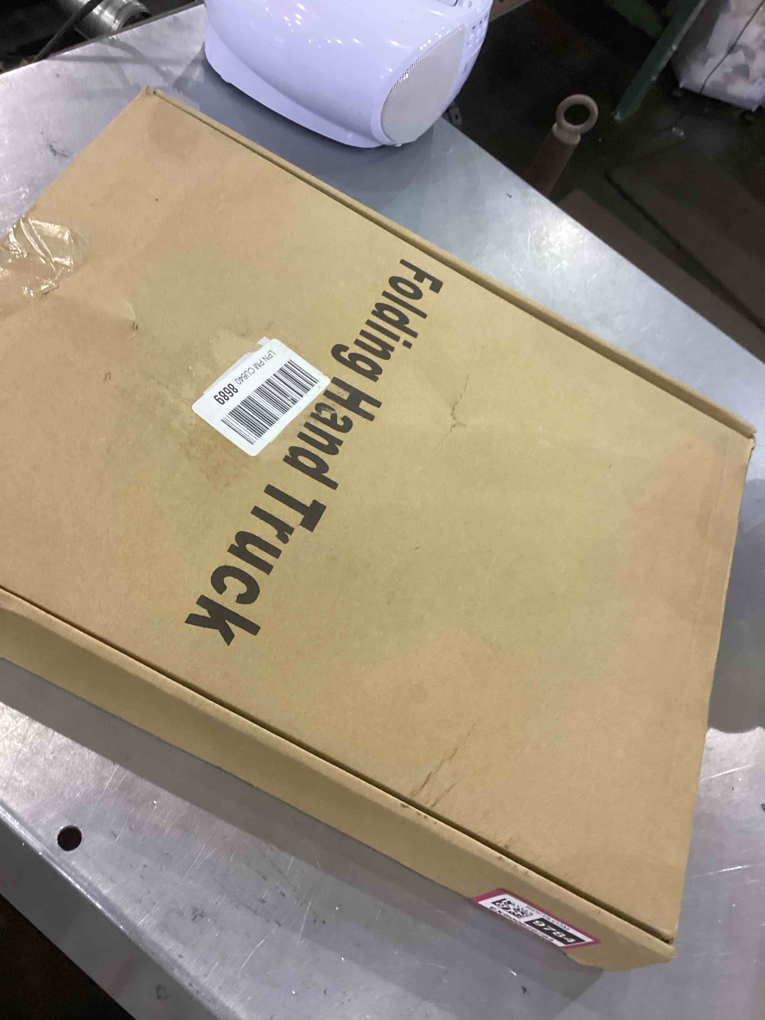 https://s3.amazonaws.com/lotting-images-prod/bidfta/EXS00629784_1695124933050.jpeg