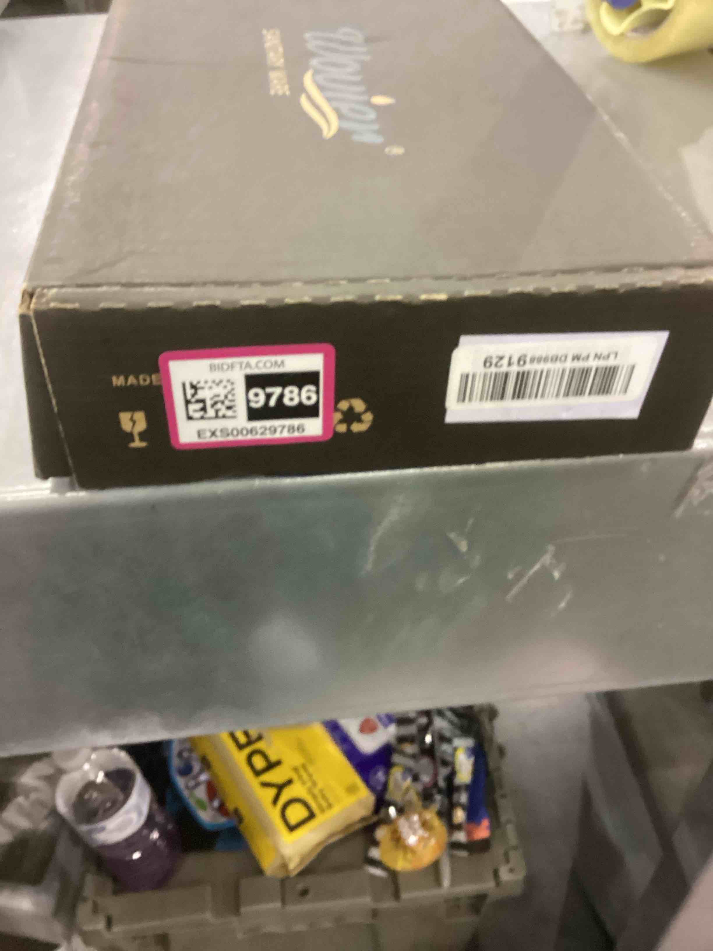 https://s3.amazonaws.com/lotting-images-prod/bidfta/EXS00629786_1695125026672.jpeg