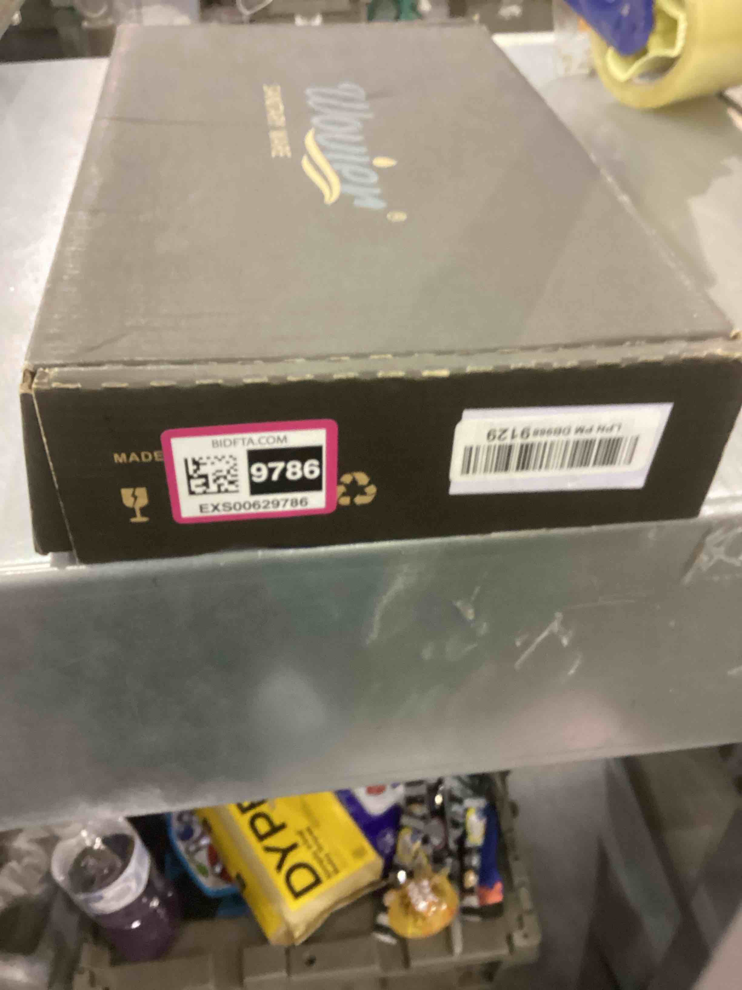 https://s3.amazonaws.com/lotting-images-prod/bidfta/EXS00629786_1695125027816.jpeg