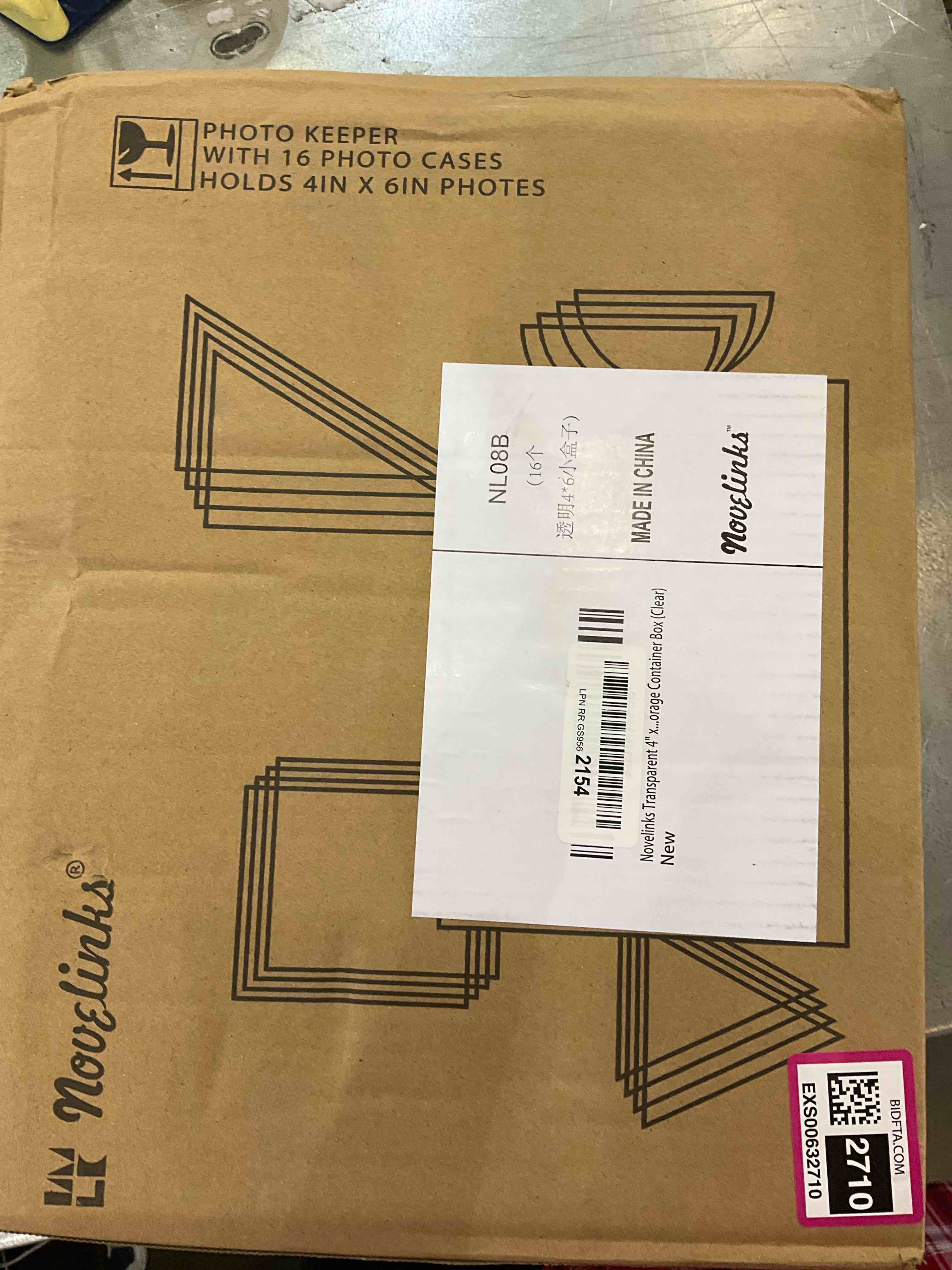 https://s3.amazonaws.com/lotting-images-prod/bidfta/EXS00632710_1696878302228.jpeg