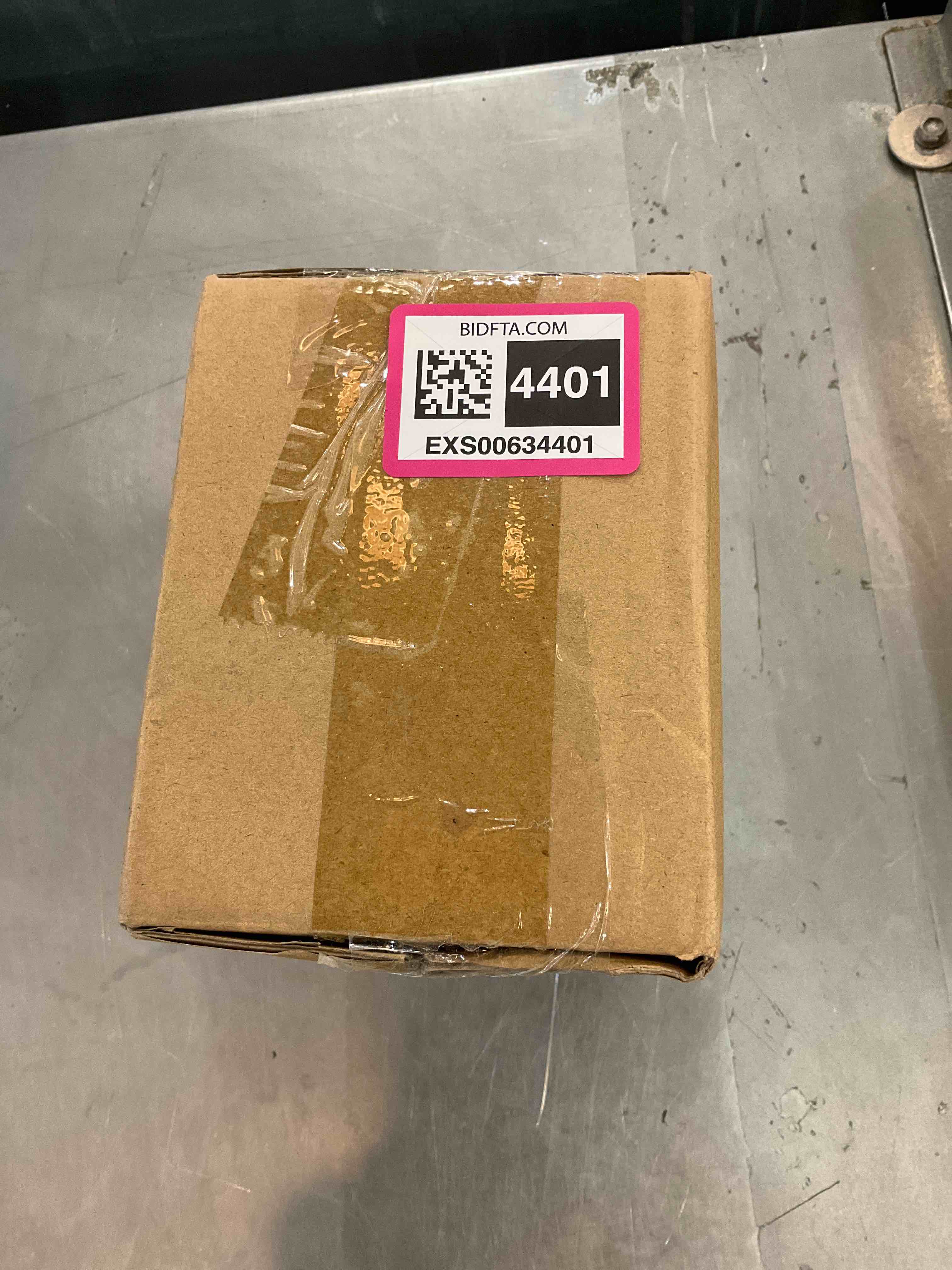 https://s3.amazonaws.com/lotting-images-prod/bidfta/EXS00634401_1694713695271.jpeg