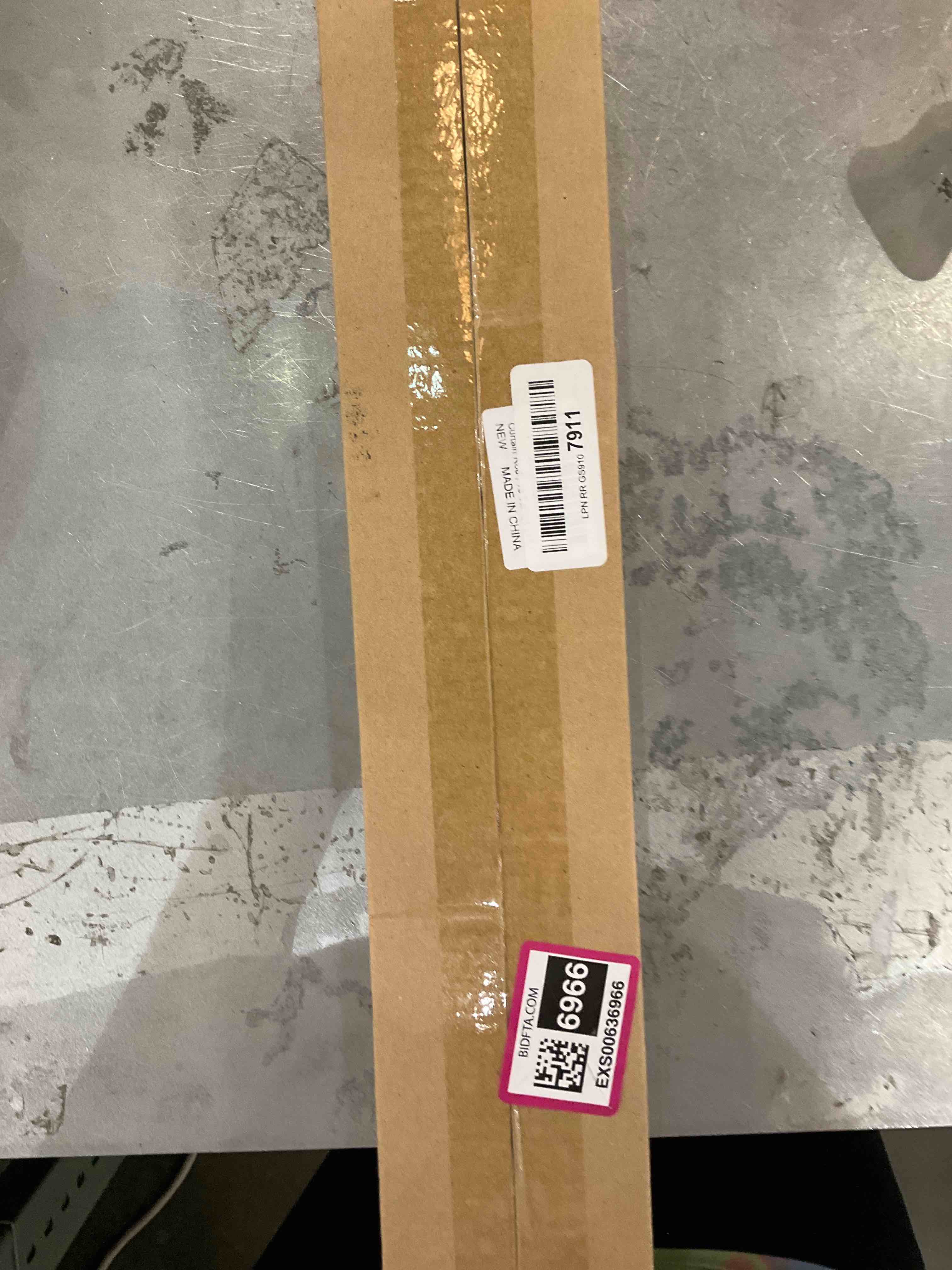 https://s3.amazonaws.com/lotting-images-prod/bidfta/EXS00636966_1695064096351.jpeg