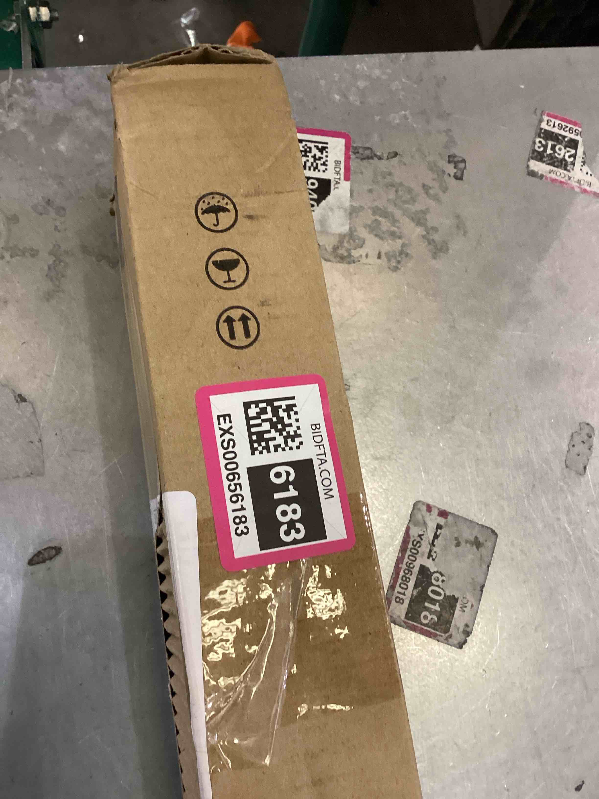 https://s3.amazonaws.com/lotting-images-prod/bidfta/EXS00656183_1705954186458.jpeg