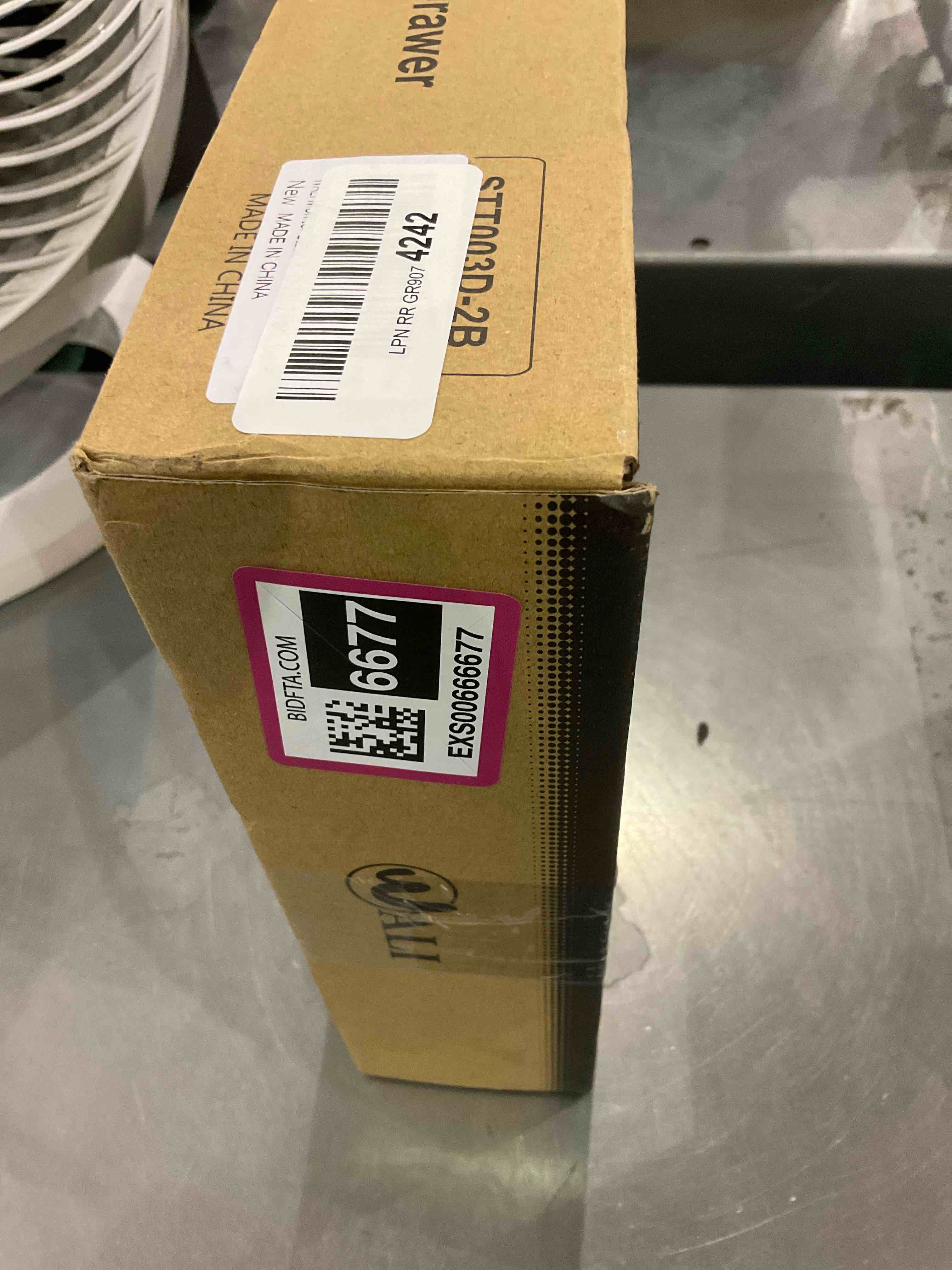 https://s3.amazonaws.com/lotting-images-prod/bidfta/EXS00666677_1697199228530.jpeg