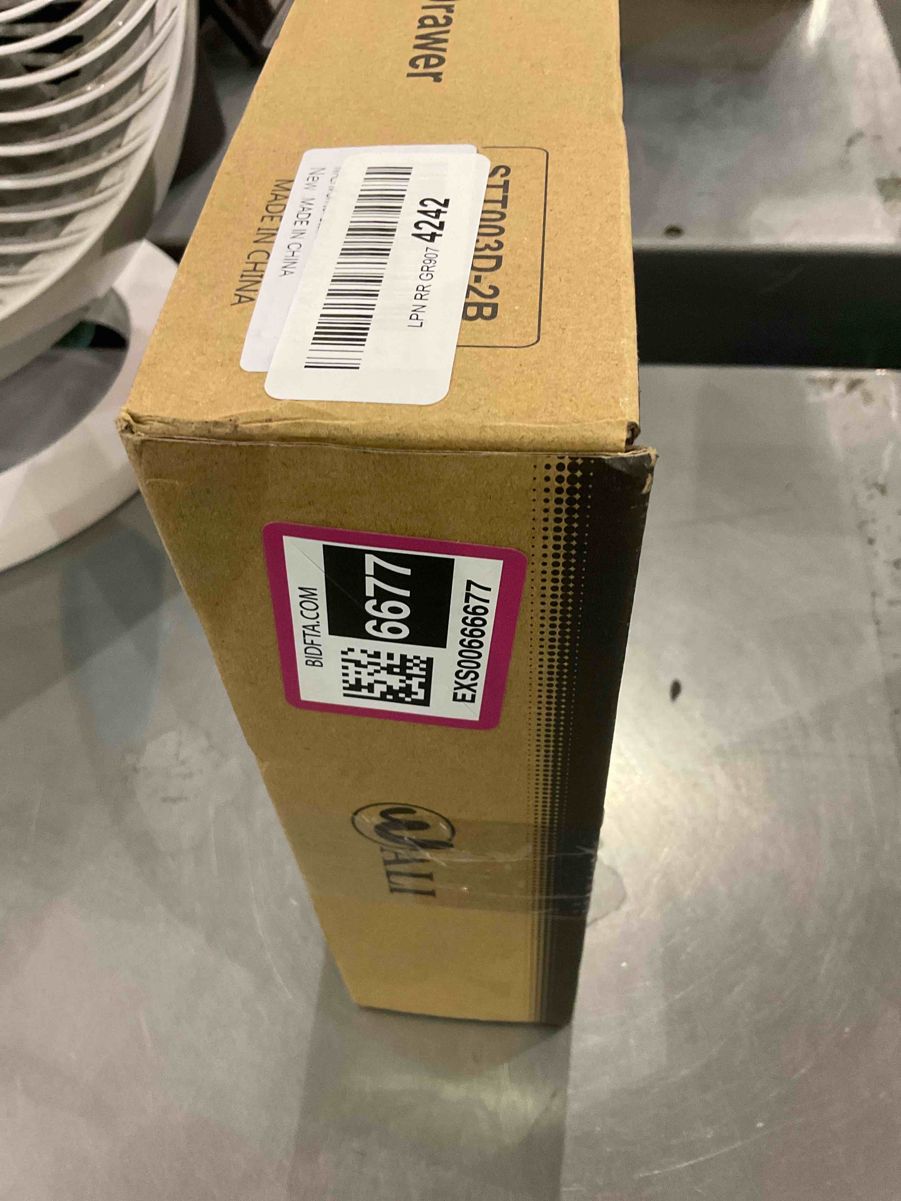 https://s3.amazonaws.com/lotting-images-prod/bidfta/EXS00666677_1697199229618.jpeg