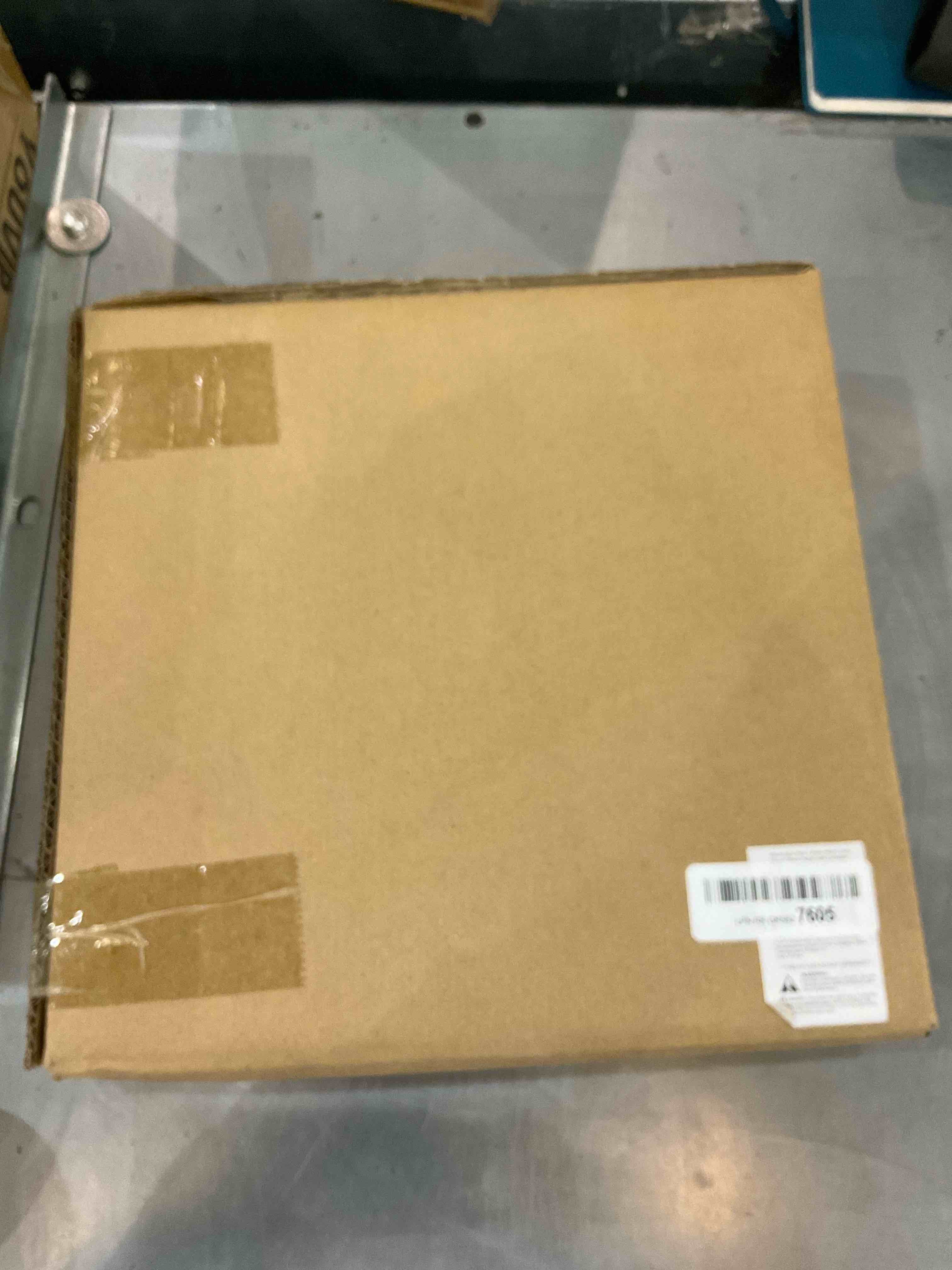 https://s3.amazonaws.com/lotting-images-prod/bidfta/EXS00669380_1697224283950.jpeg