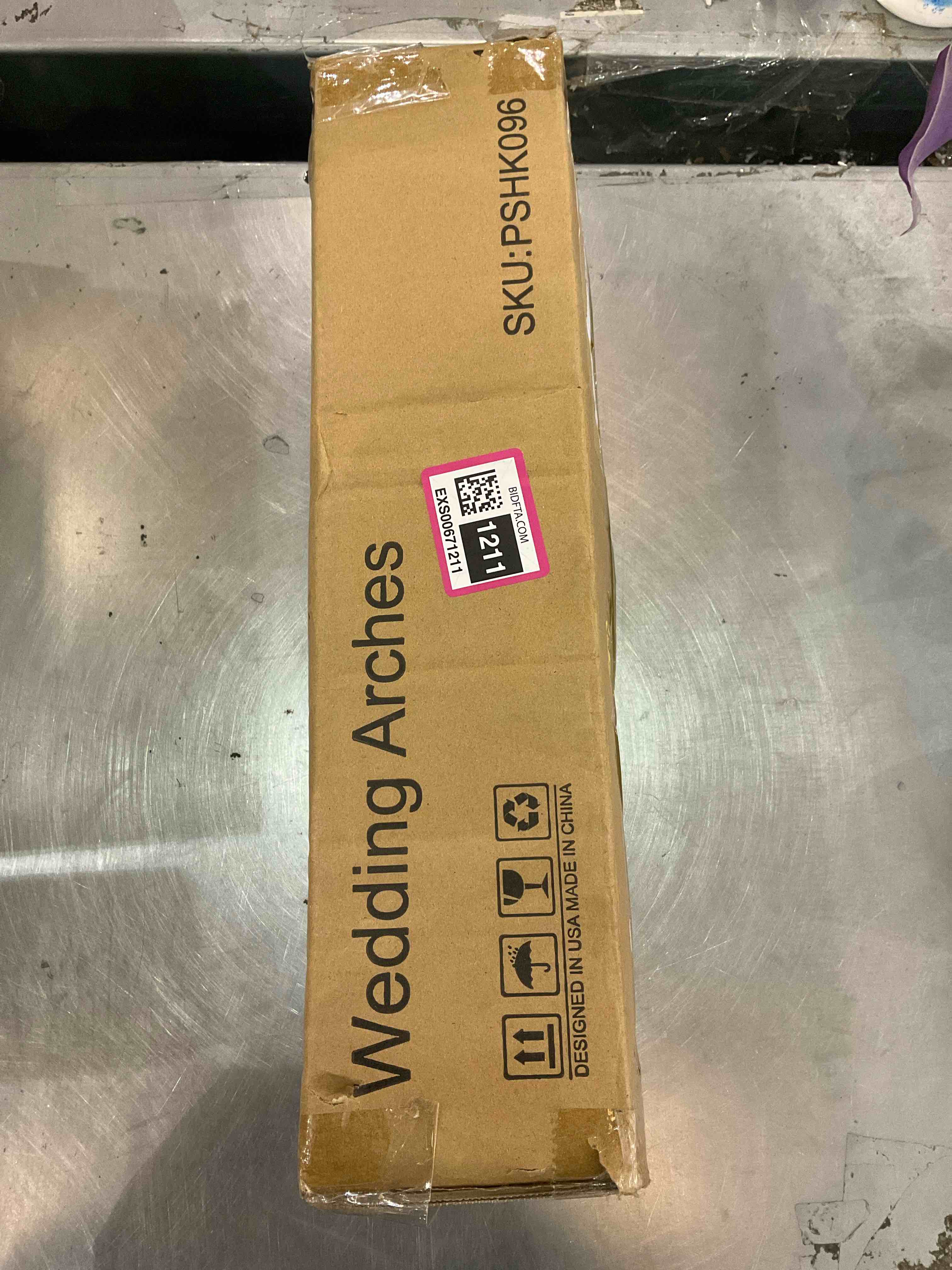 https://s3.amazonaws.com/lotting-images-prod/bidfta/EXS00671211_1704225972793.jpeg