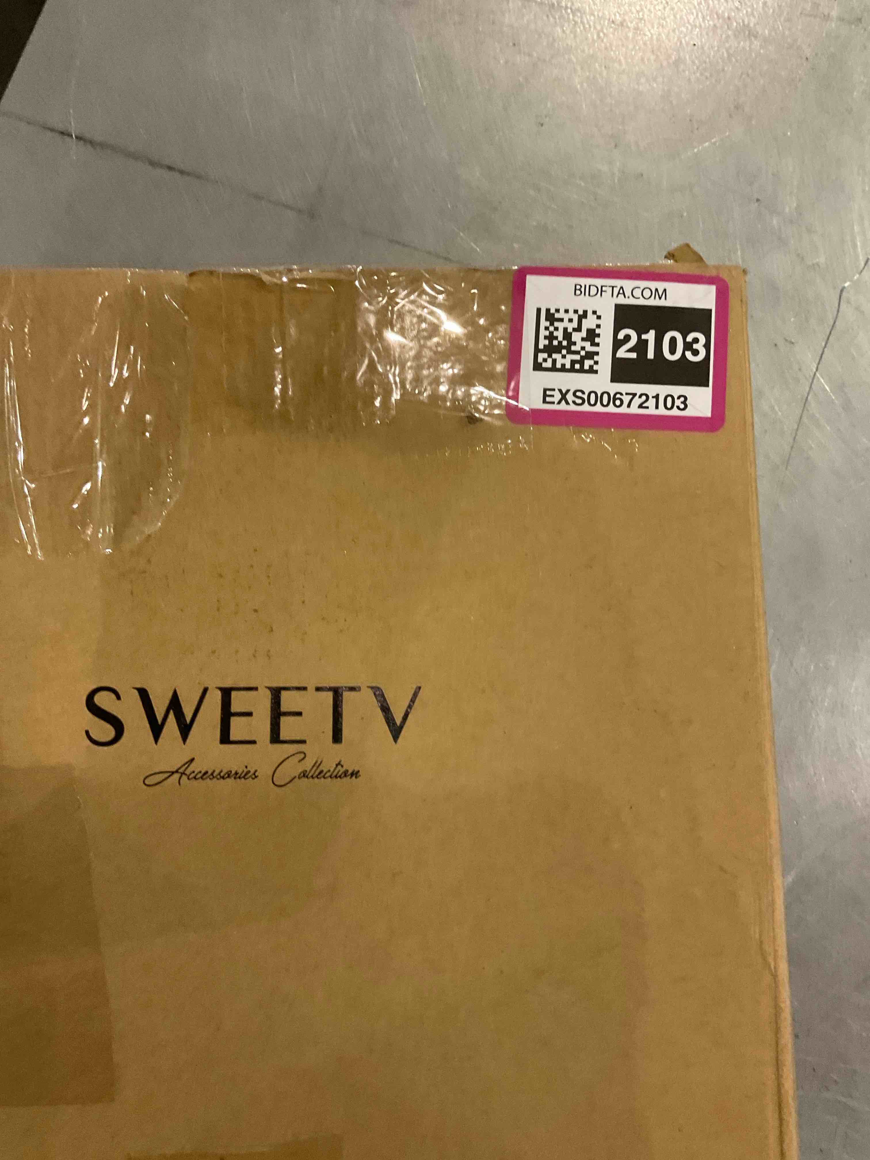 https://s3.amazonaws.com/lotting-images-prod/bidfta/EXS00672103_1703855513464.jpeg