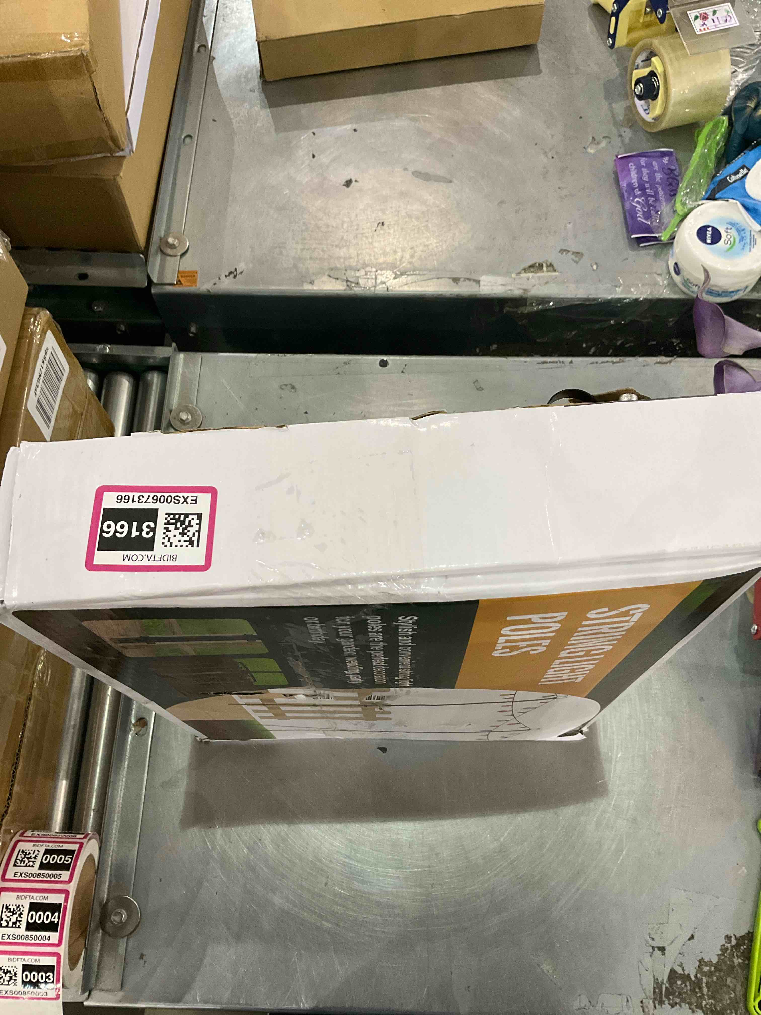 https://s3.amazonaws.com/lotting-images-prod/bidfta/EXS00673166_1703872617702.jpeg