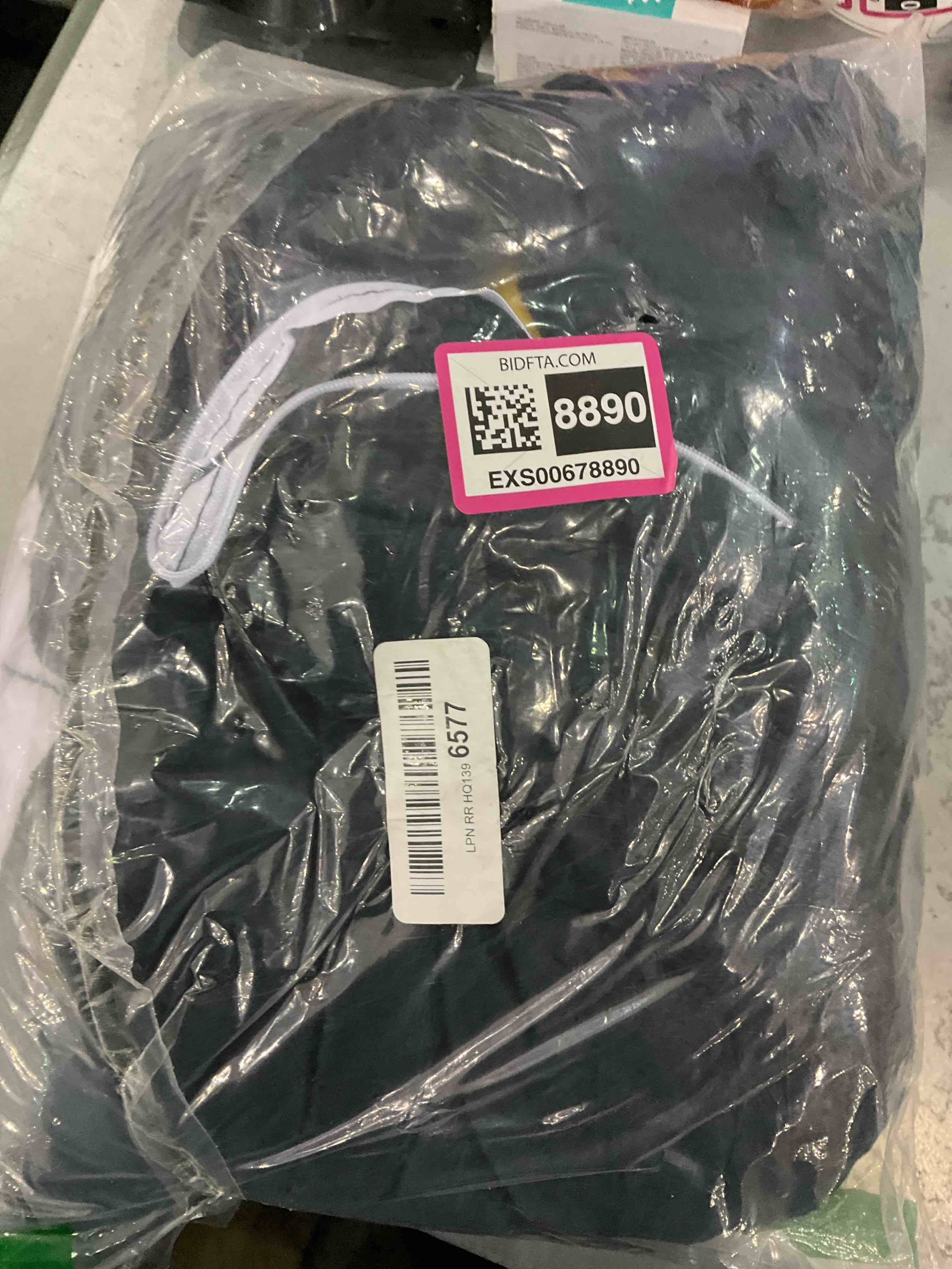 https://s3.amazonaws.com/lotting-images-prod/bidfta/EXS00678890_1704456734613.jpeg