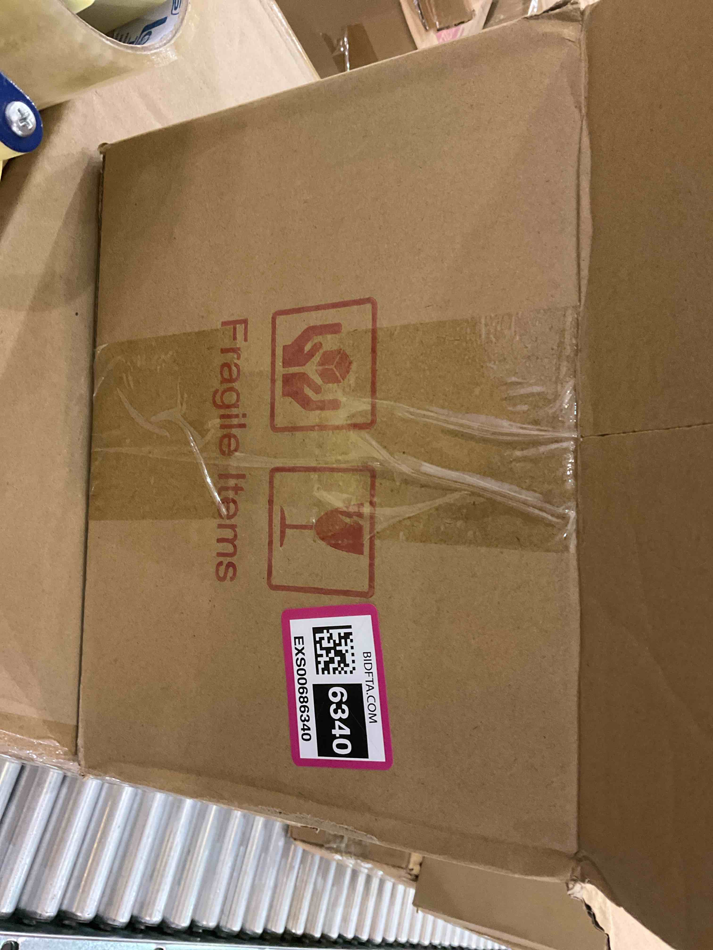 https://s3.amazonaws.com/lotting-images-prod/bidfta/EXS00686340_1697561628102.jpeg