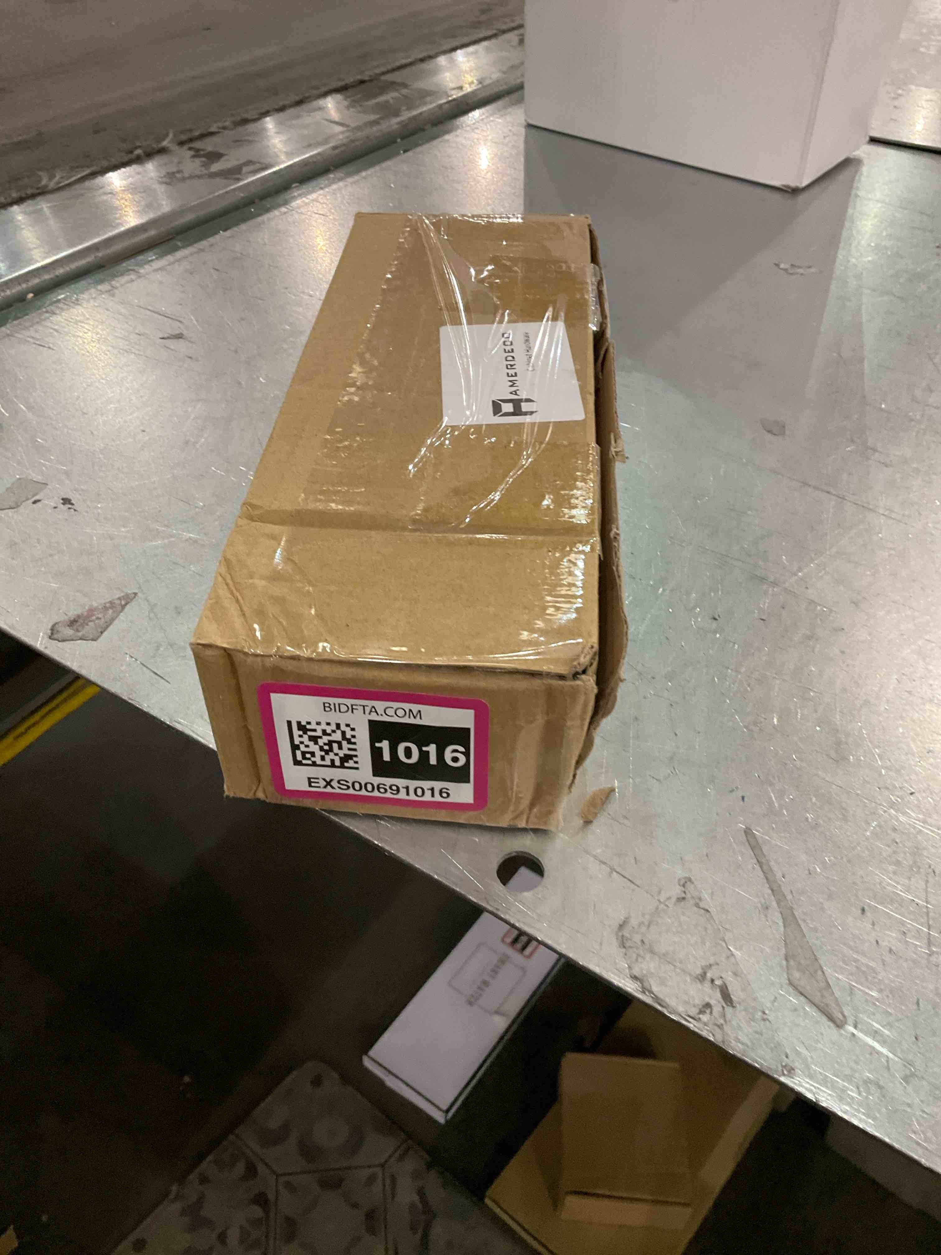 https://s3.amazonaws.com/lotting-images-prod/bidfta/EXS00691016_1697744602605.jpeg