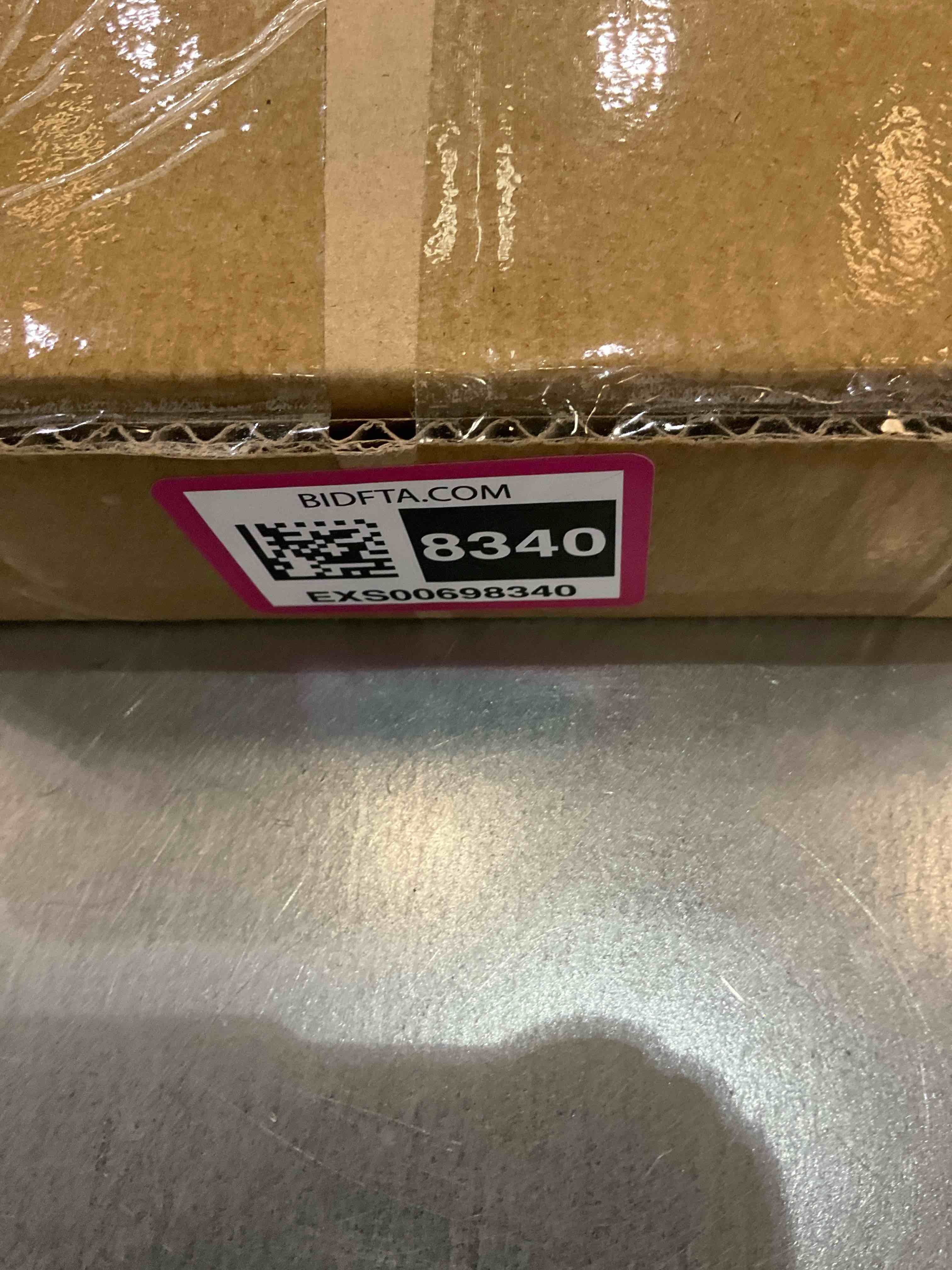 https://s3.amazonaws.com/lotting-images-prod/bidfta/EXS00698340_1697745239027.jpeg