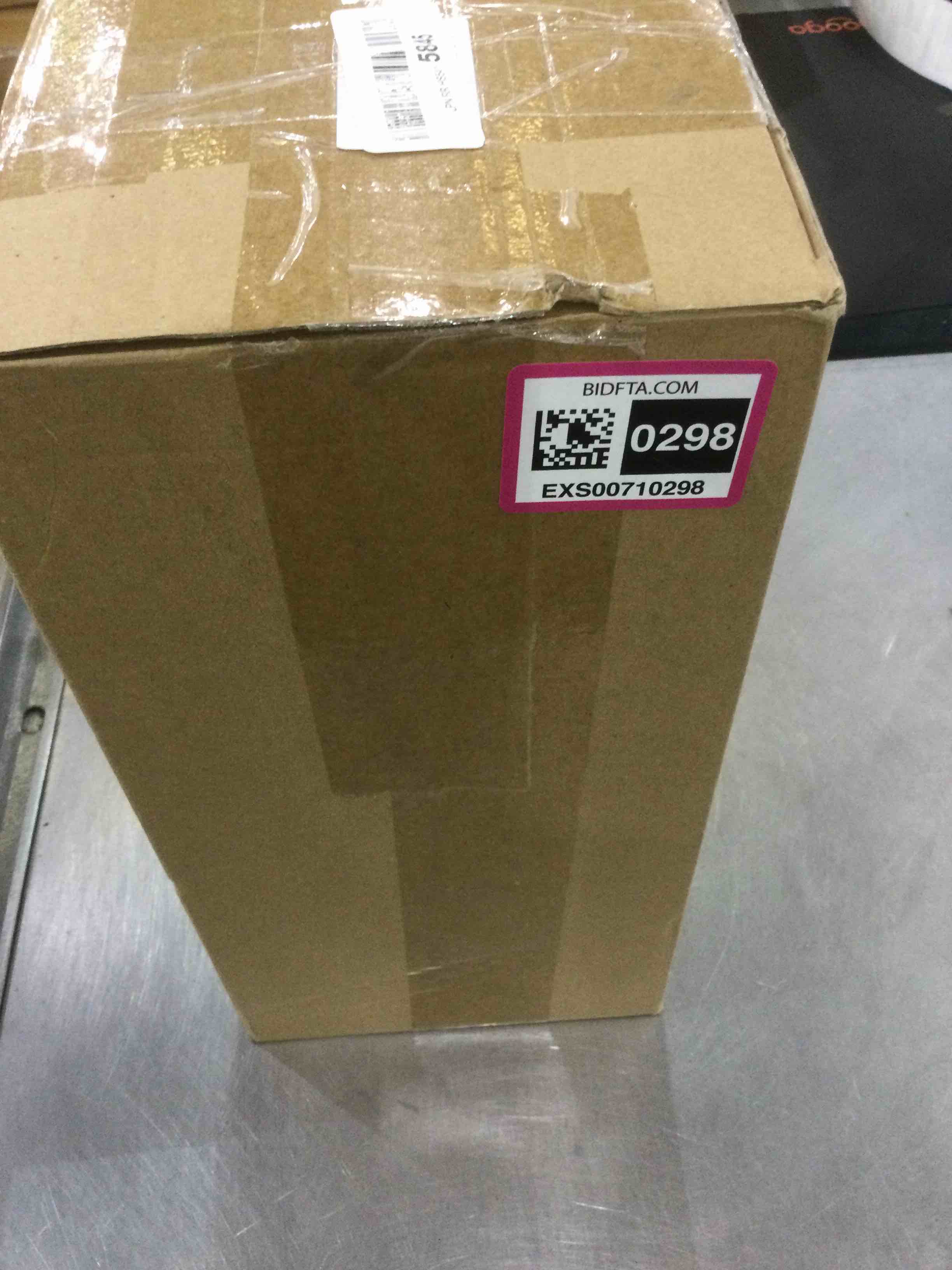 https://s3.amazonaws.com/lotting-images-prod/bidfta/EXS00710298_1703016302835.jpeg