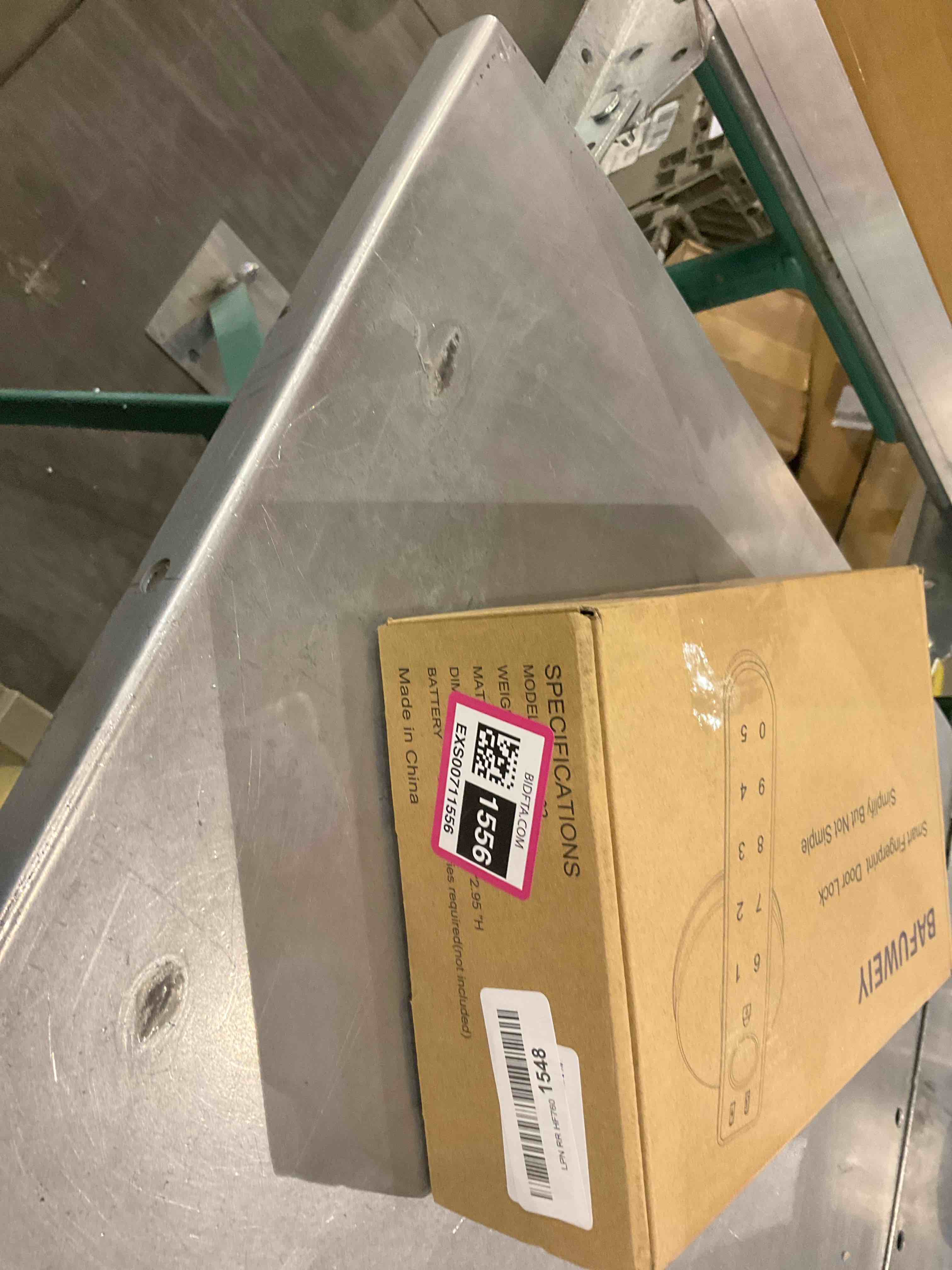 https://s3.amazonaws.com/lotting-images-prod/bidfta/EXS00711556_1702558997527.jpeg