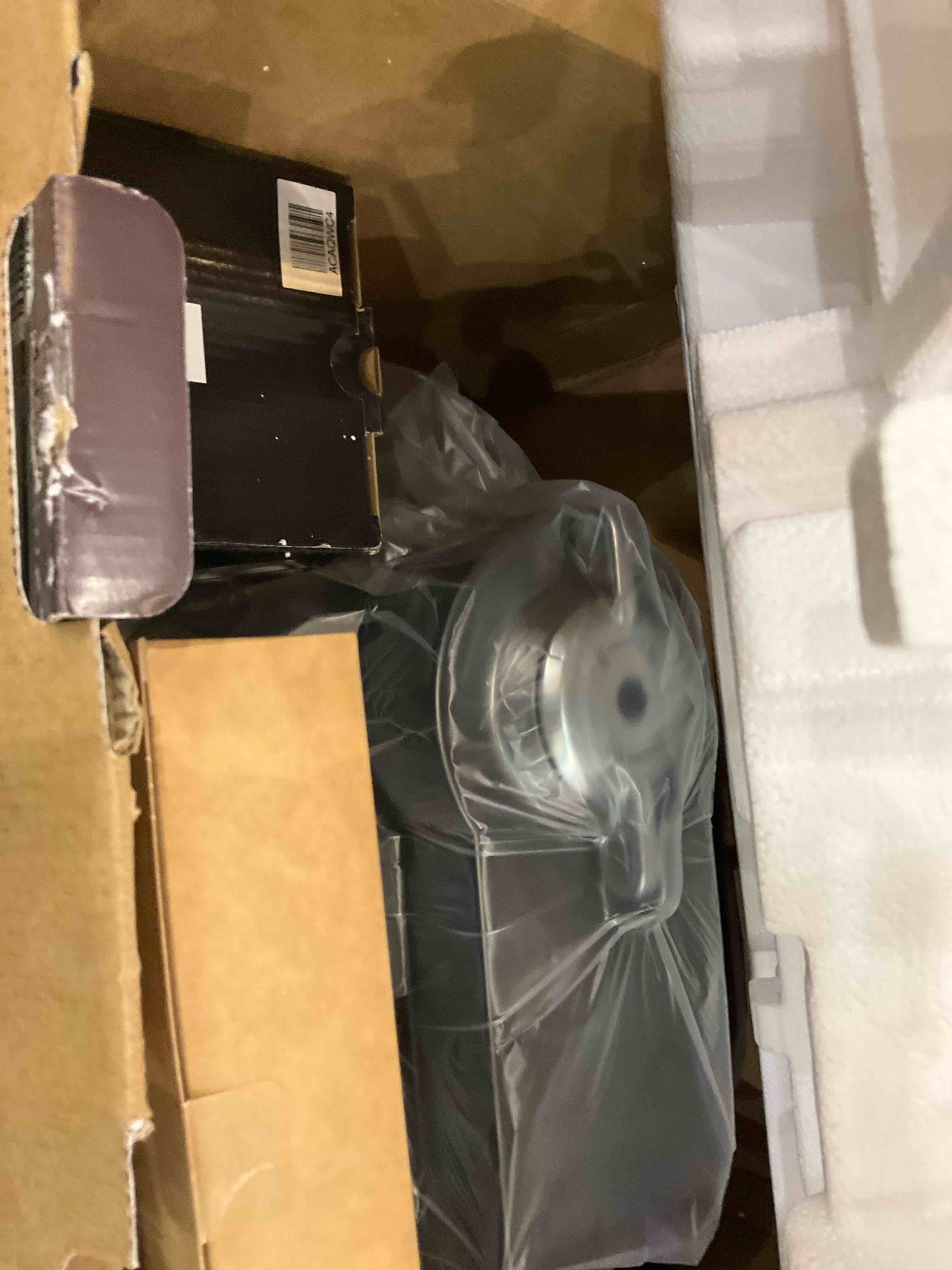 https://s3.amazonaws.com/lotting-images-prod/bidfta/EXS00711647_1702570808531.jpeg