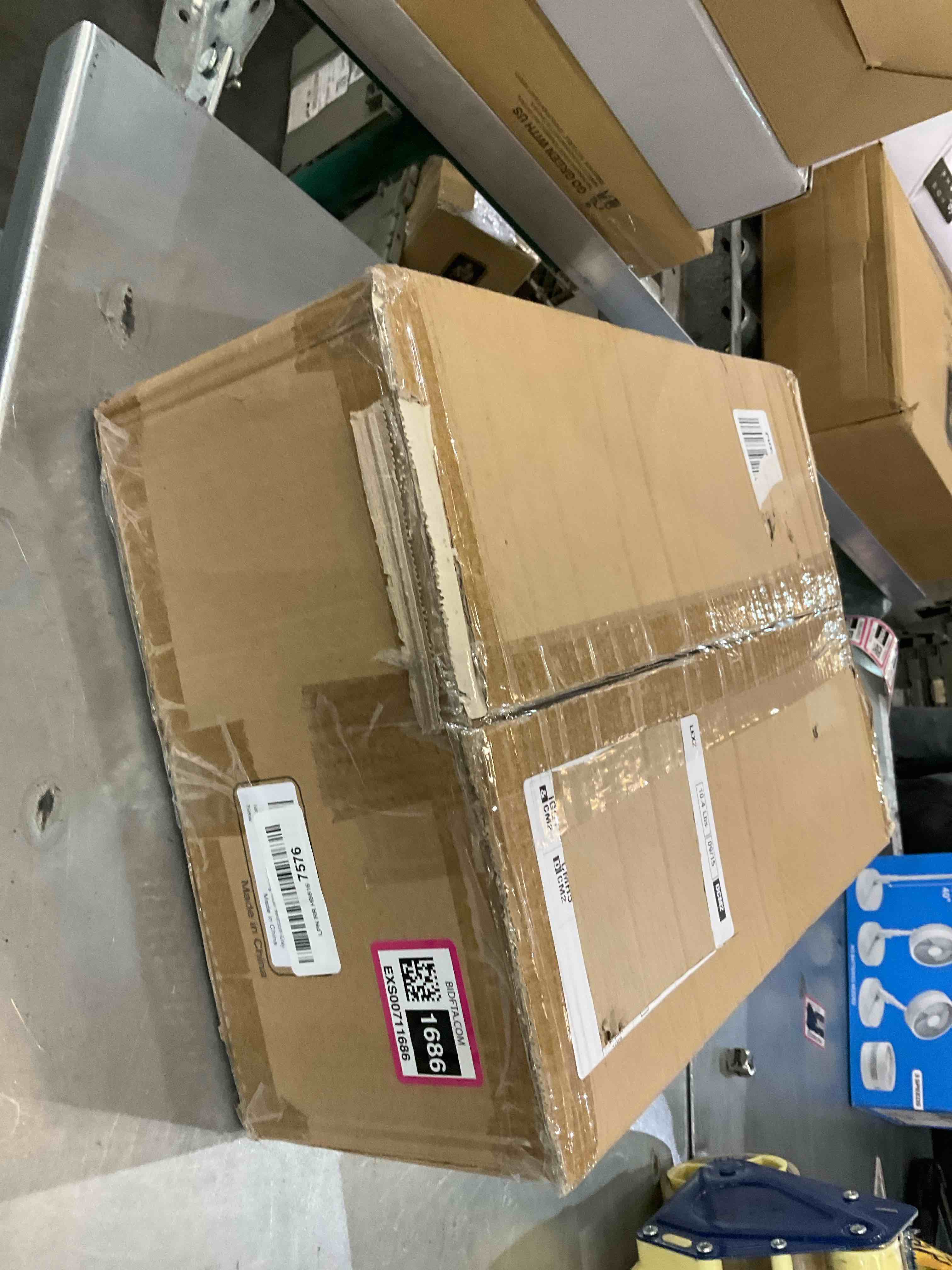 https://s3.amazonaws.com/lotting-images-prod/bidfta/EXS00711686_1702579212422.jpeg