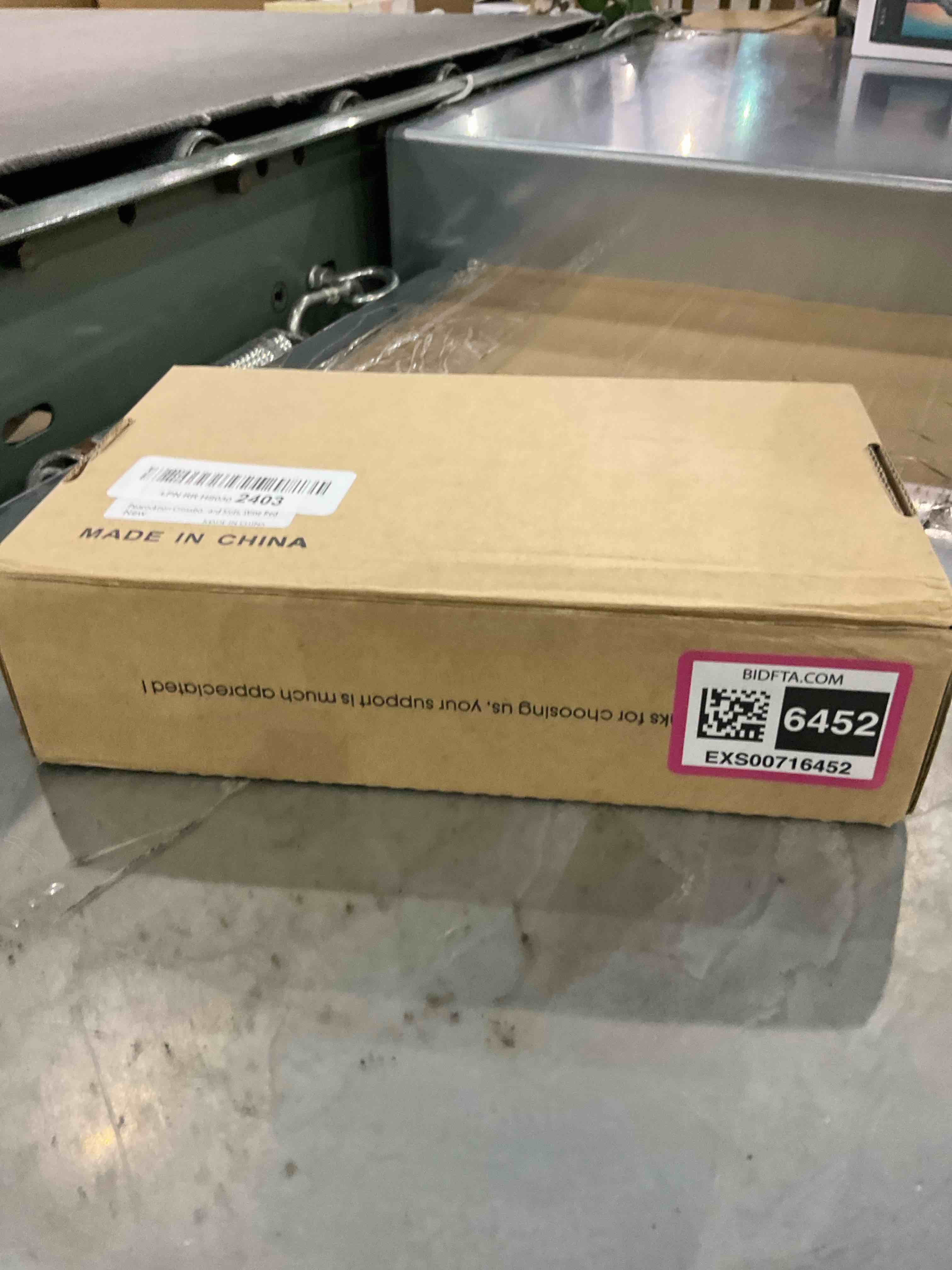 https://s3.amazonaws.com/lotting-images-prod/bidfta/EXS00716452_1702470306269.jpeg