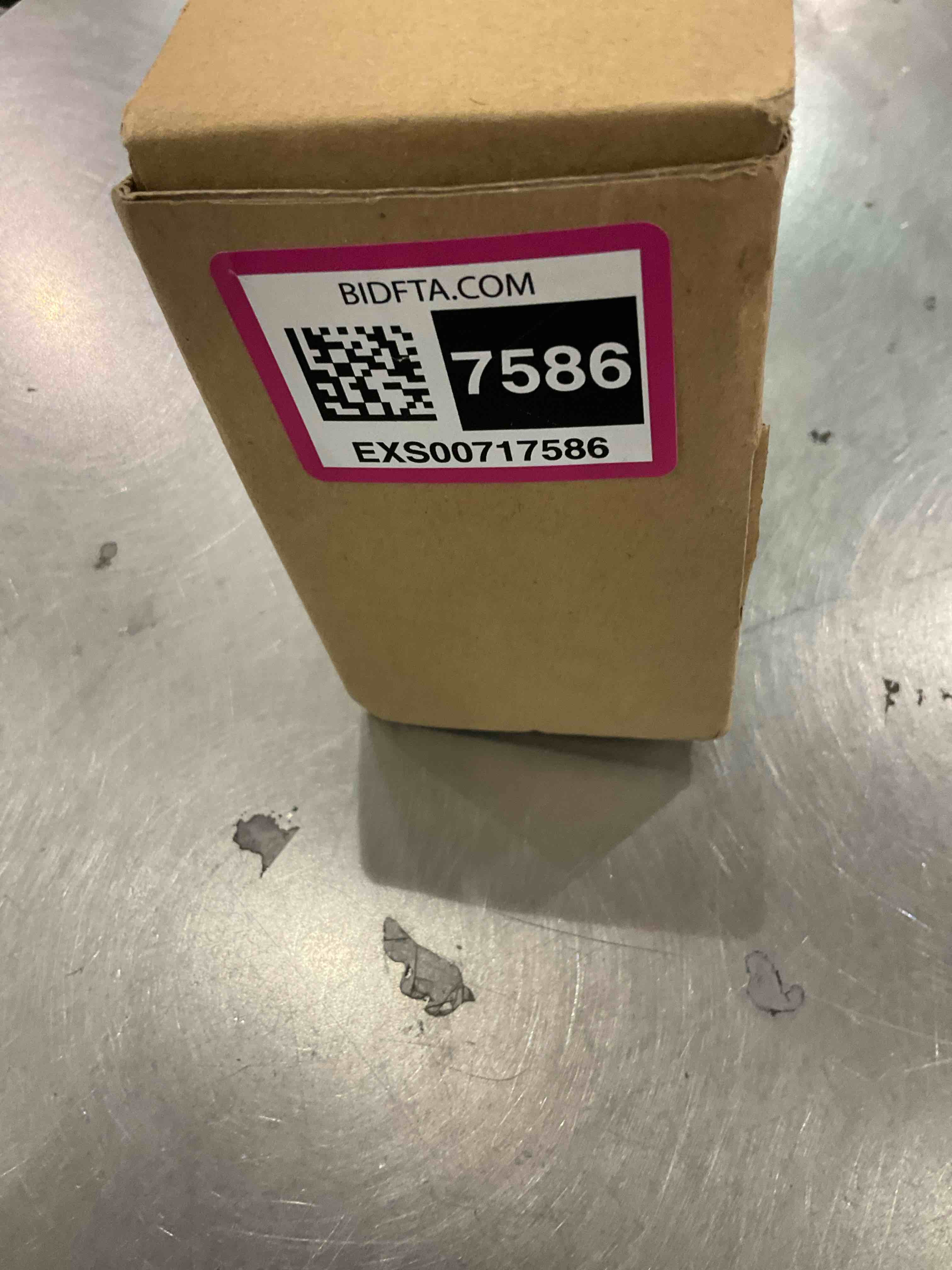 https://s3.amazonaws.com/lotting-images-prod/bidfta/EXS00717586_1704225629335.jpeg