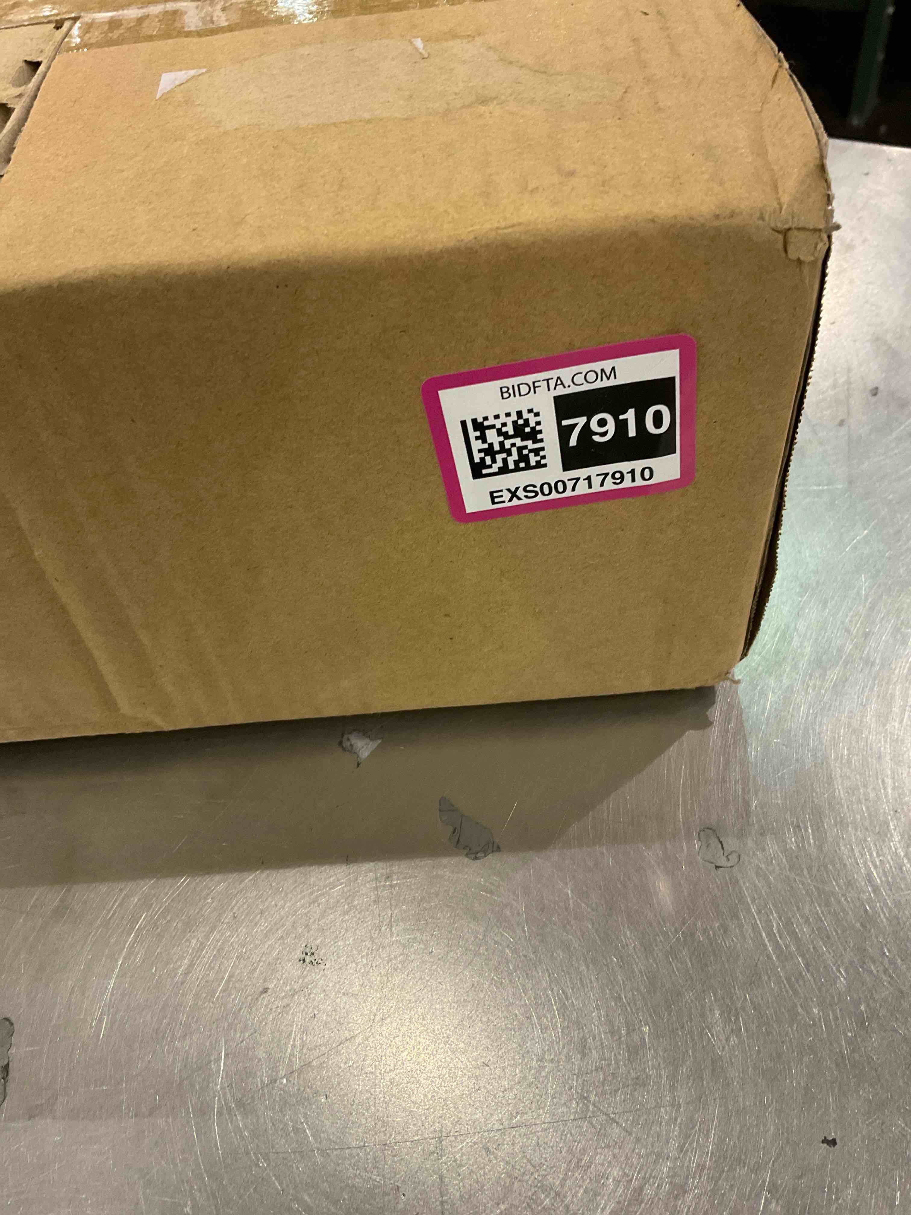 https://s3.amazonaws.com/lotting-images-prod/bidfta/EXS00717910_1704461356435.jpeg