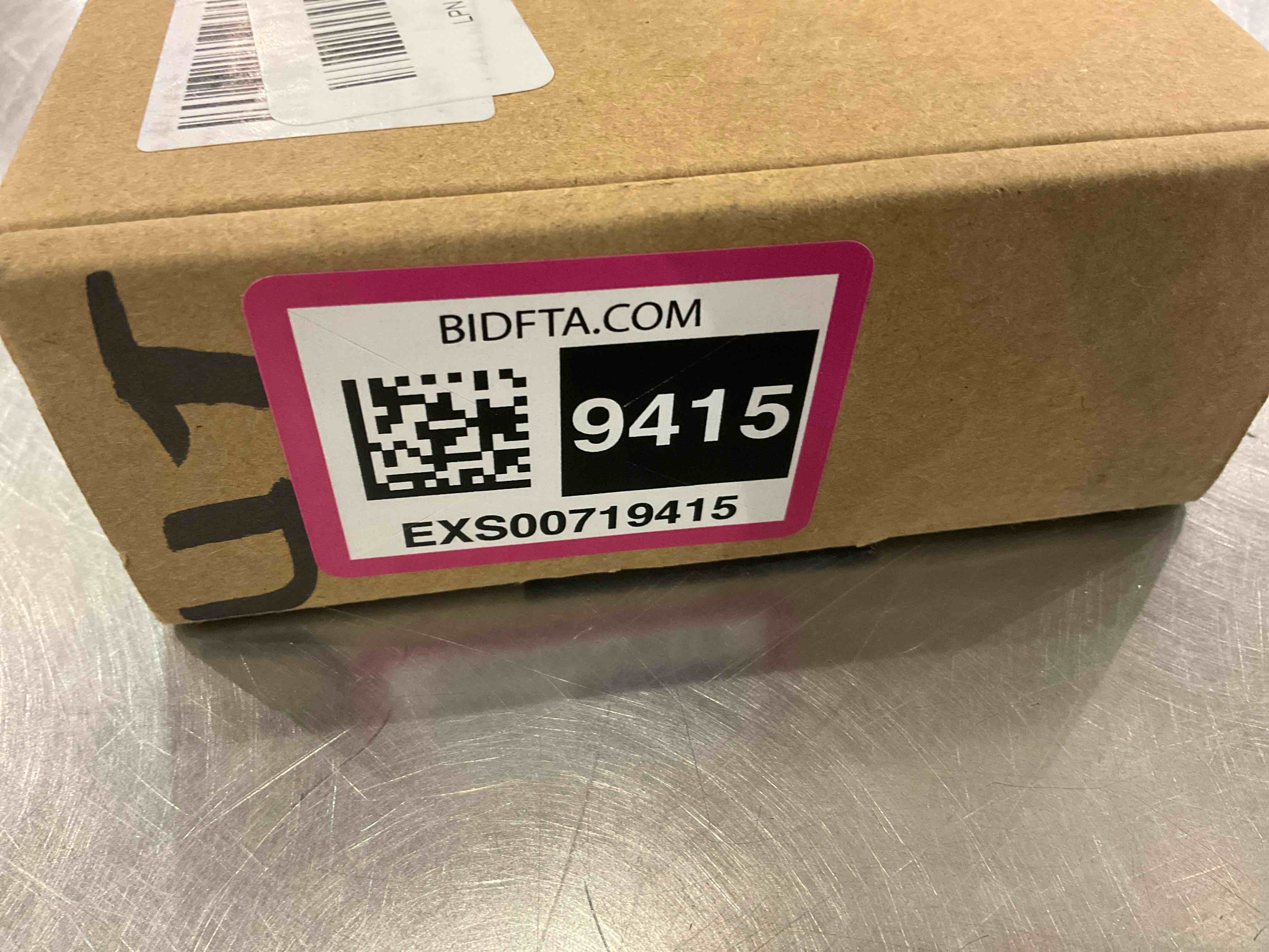 https://s3.amazonaws.com/lotting-images-prod/bidfta/EXS00719415_1702928750563.jpeg