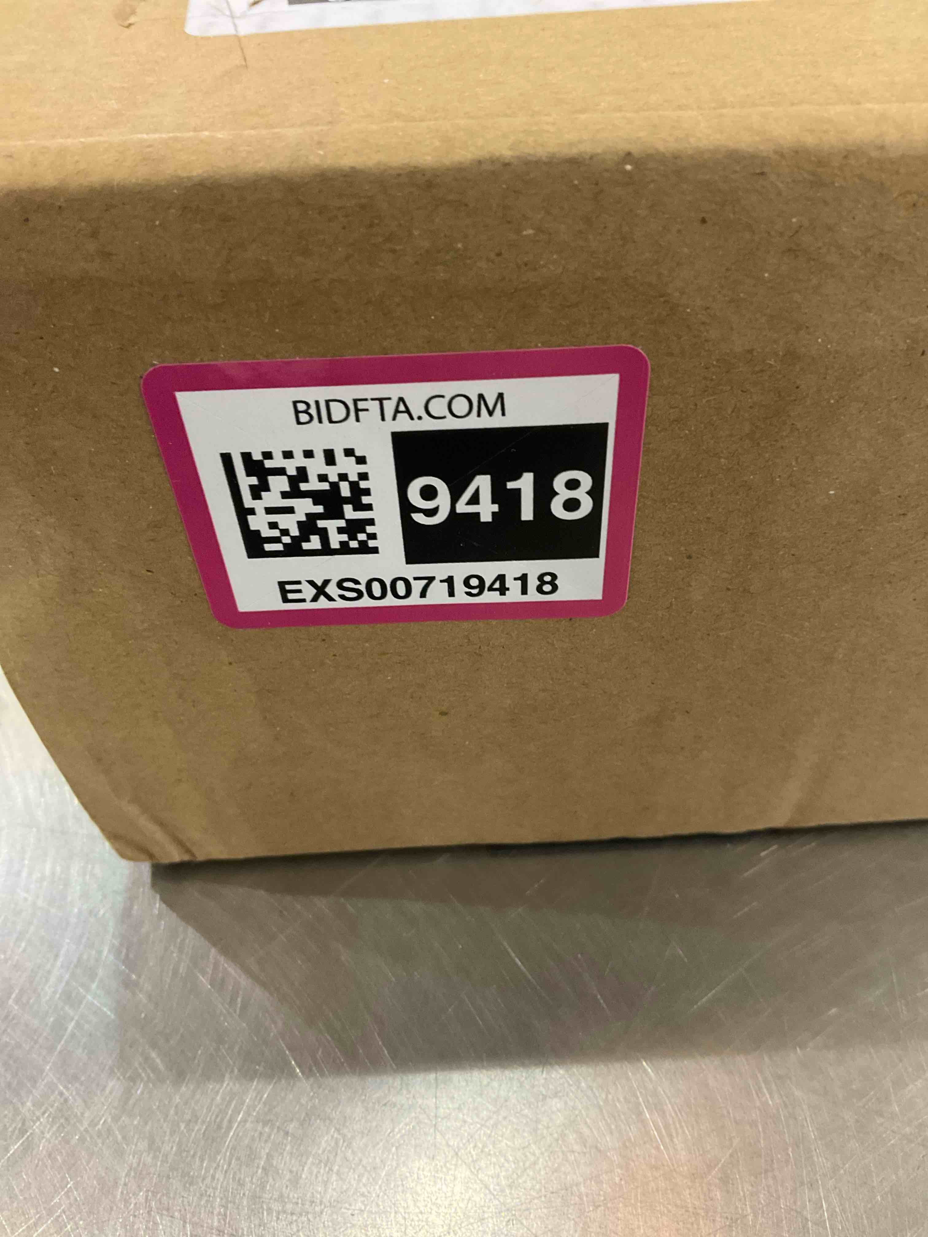 https://s3.amazonaws.com/lotting-images-prod/bidfta/EXS00719418_1702929045557.jpeg