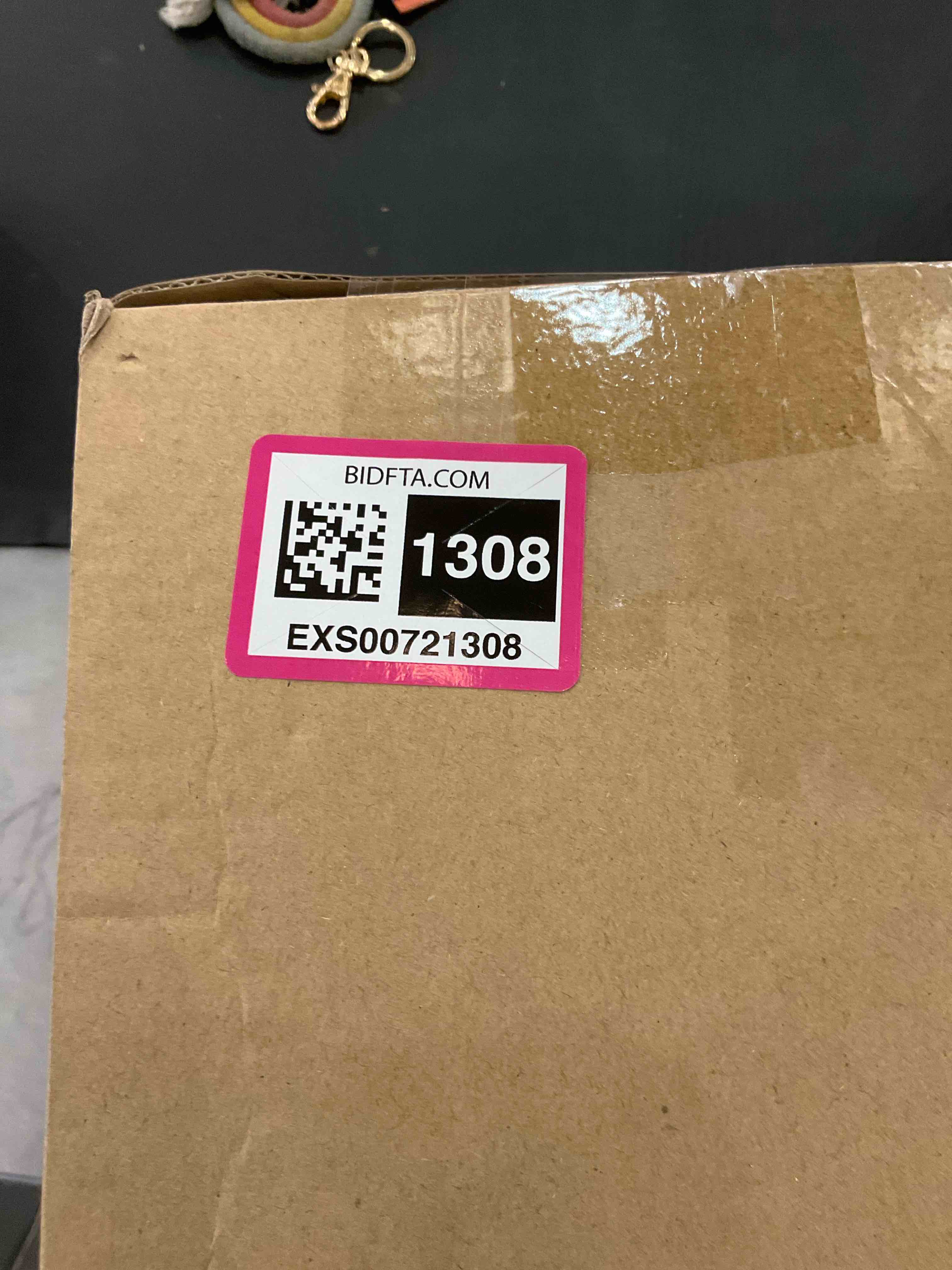 https://s3.amazonaws.com/lotting-images-prod/bidfta/EXS00721308_1705001295697.jpeg