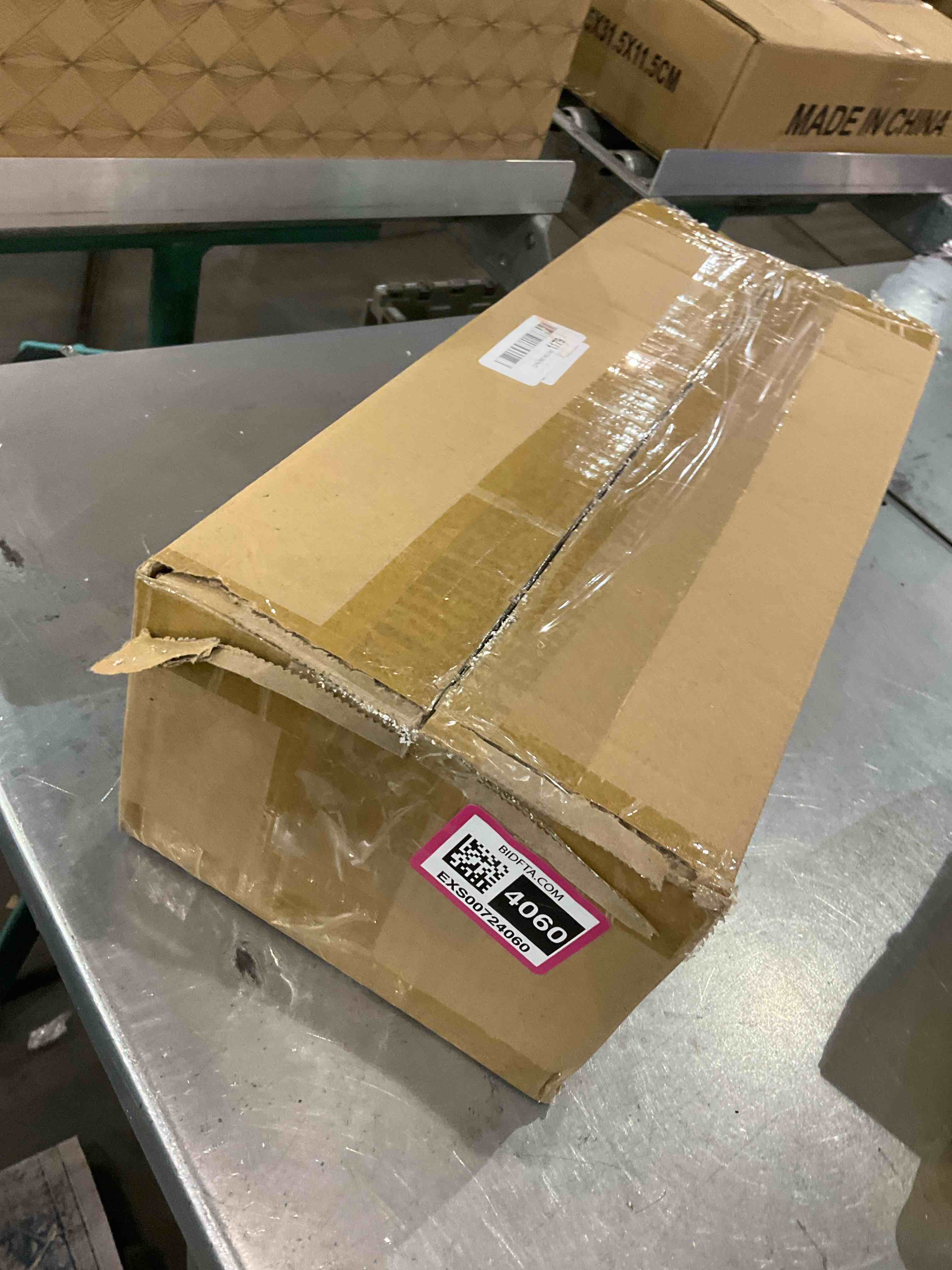 https://s3.amazonaws.com/lotting-images-prod/bidfta/EXS00724060_1703771731009.jpeg