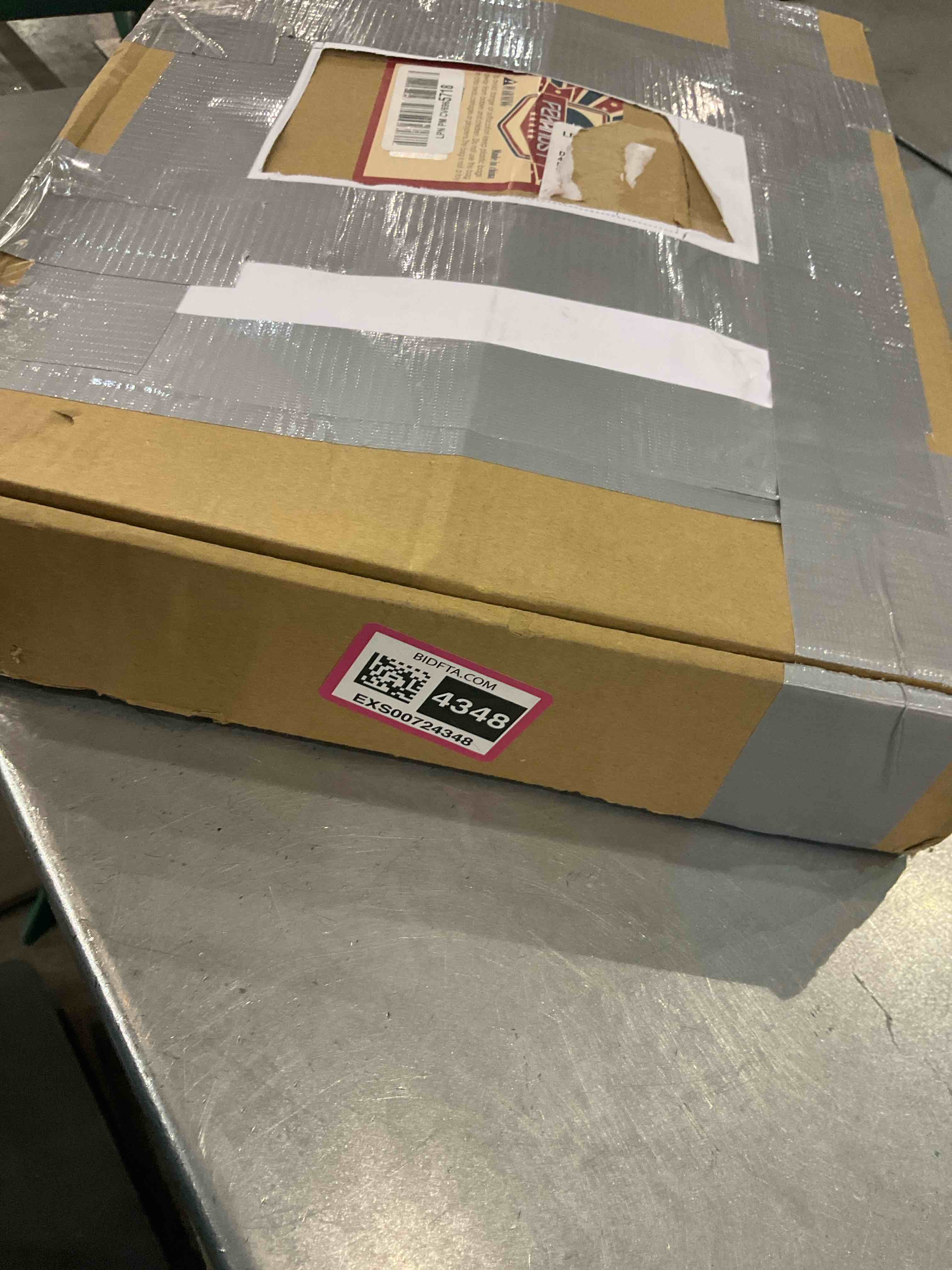 https://s3.amazonaws.com/lotting-images-prod/bidfta/EXS00724348_1704292276971.jpeg