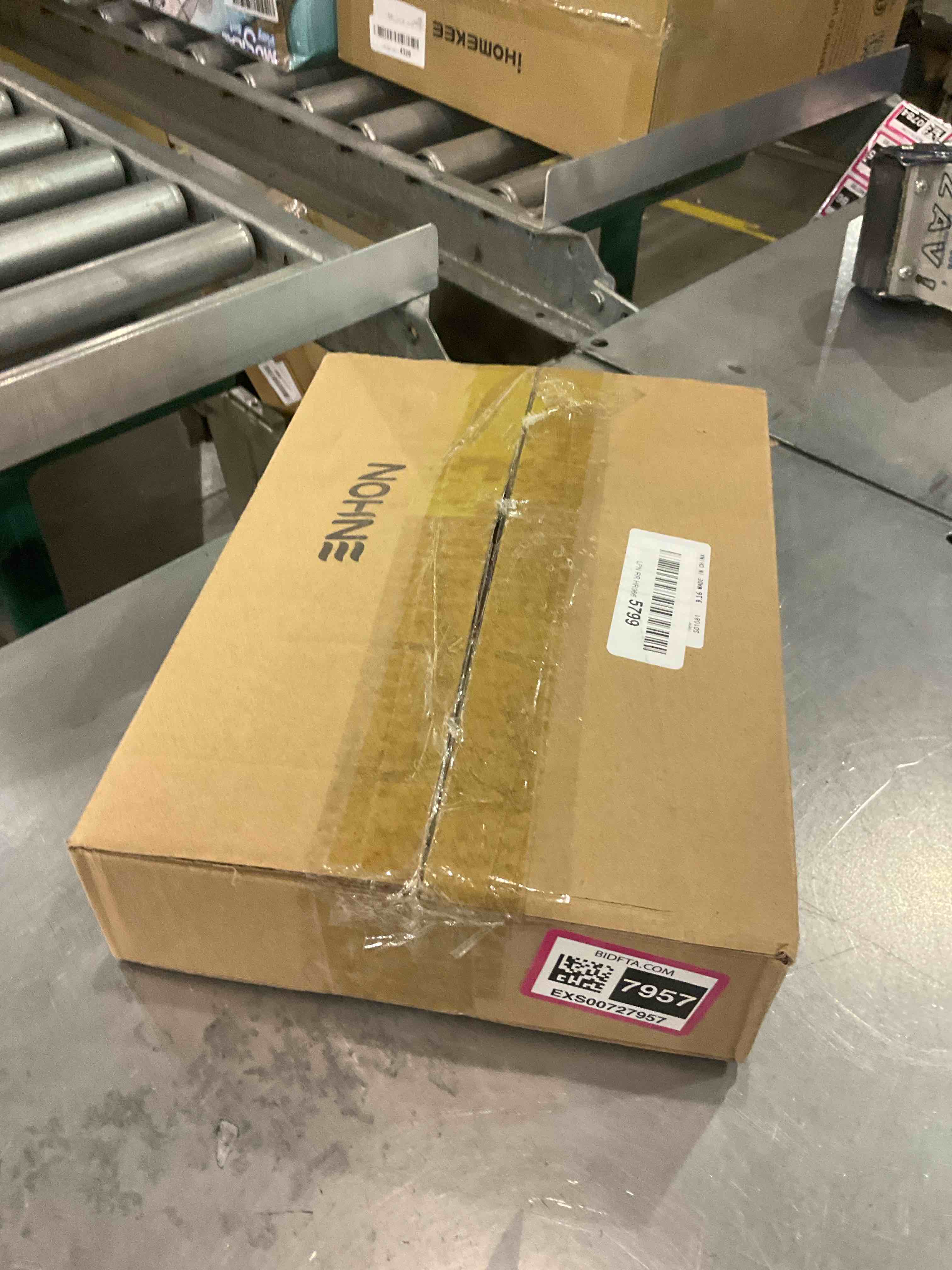 https://s3.amazonaws.com/lotting-images-prod/bidfta/EXS00727957_1704804403824.jpeg