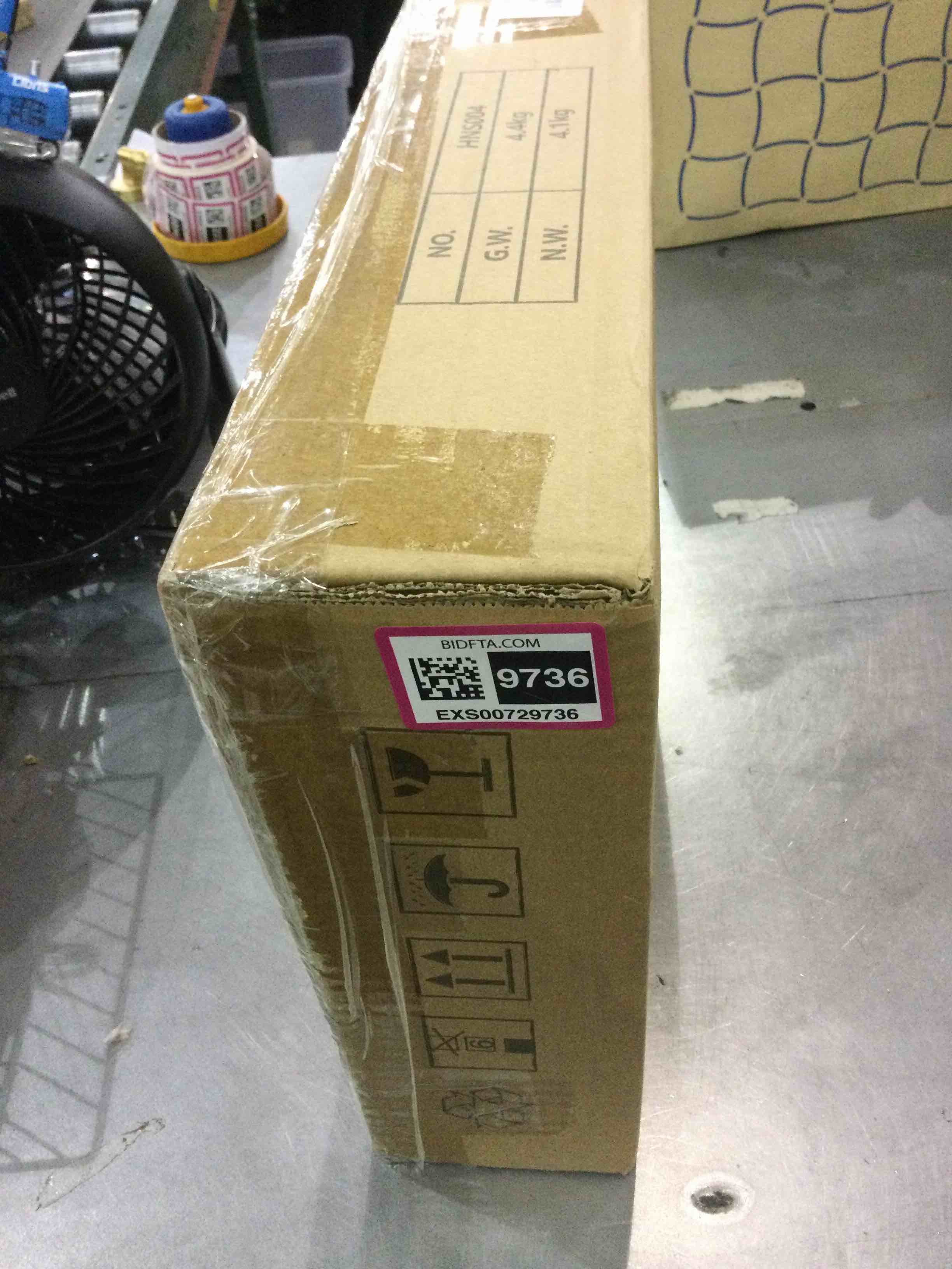 https://s3.amazonaws.com/lotting-images-prod/bidfta/EXS00729736_1703861182803.jpeg