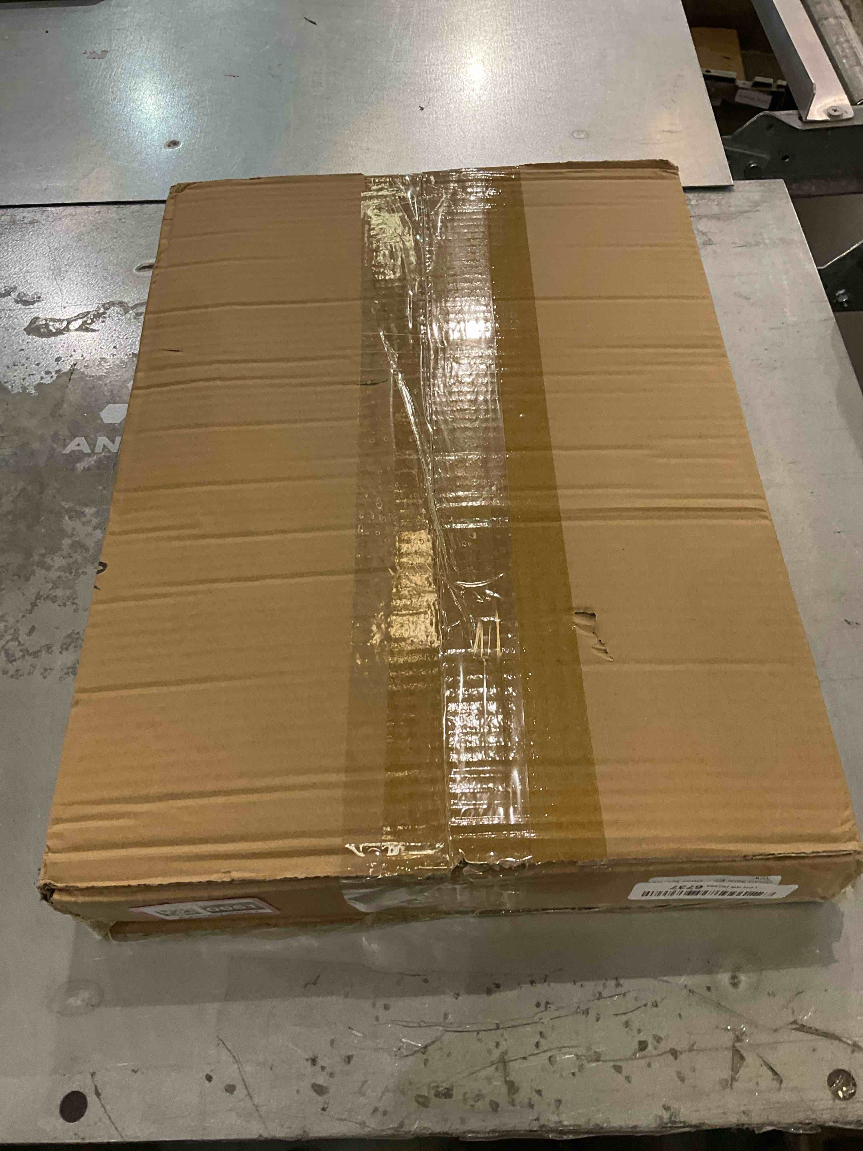 https://s3.amazonaws.com/lotting-images-prod/bidfta/EXS00730651_1703174426527.jpeg
