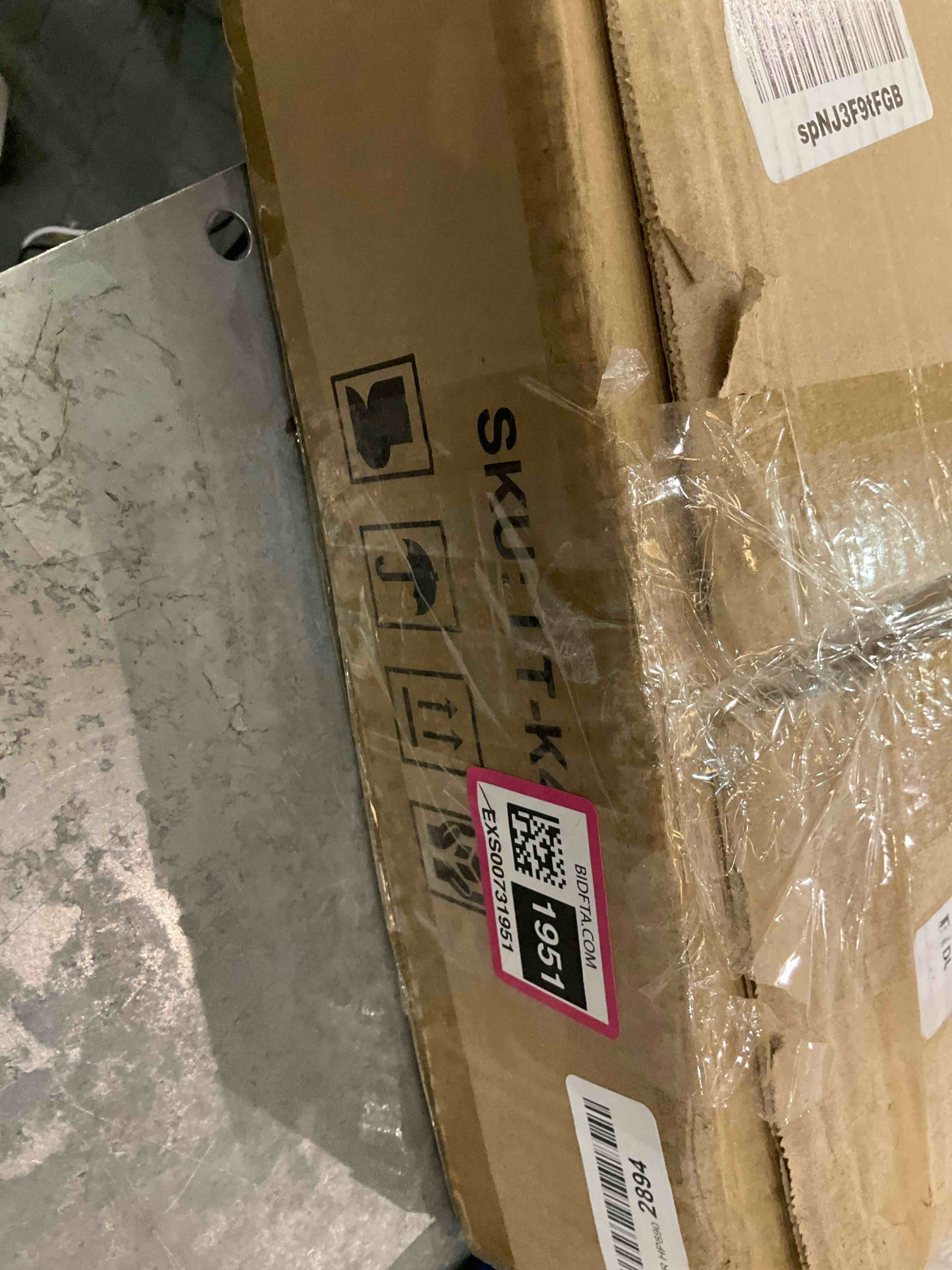 https://s3.amazonaws.com/lotting-images-prod/bidfta/EXS00731951_1703008535906.jpeg