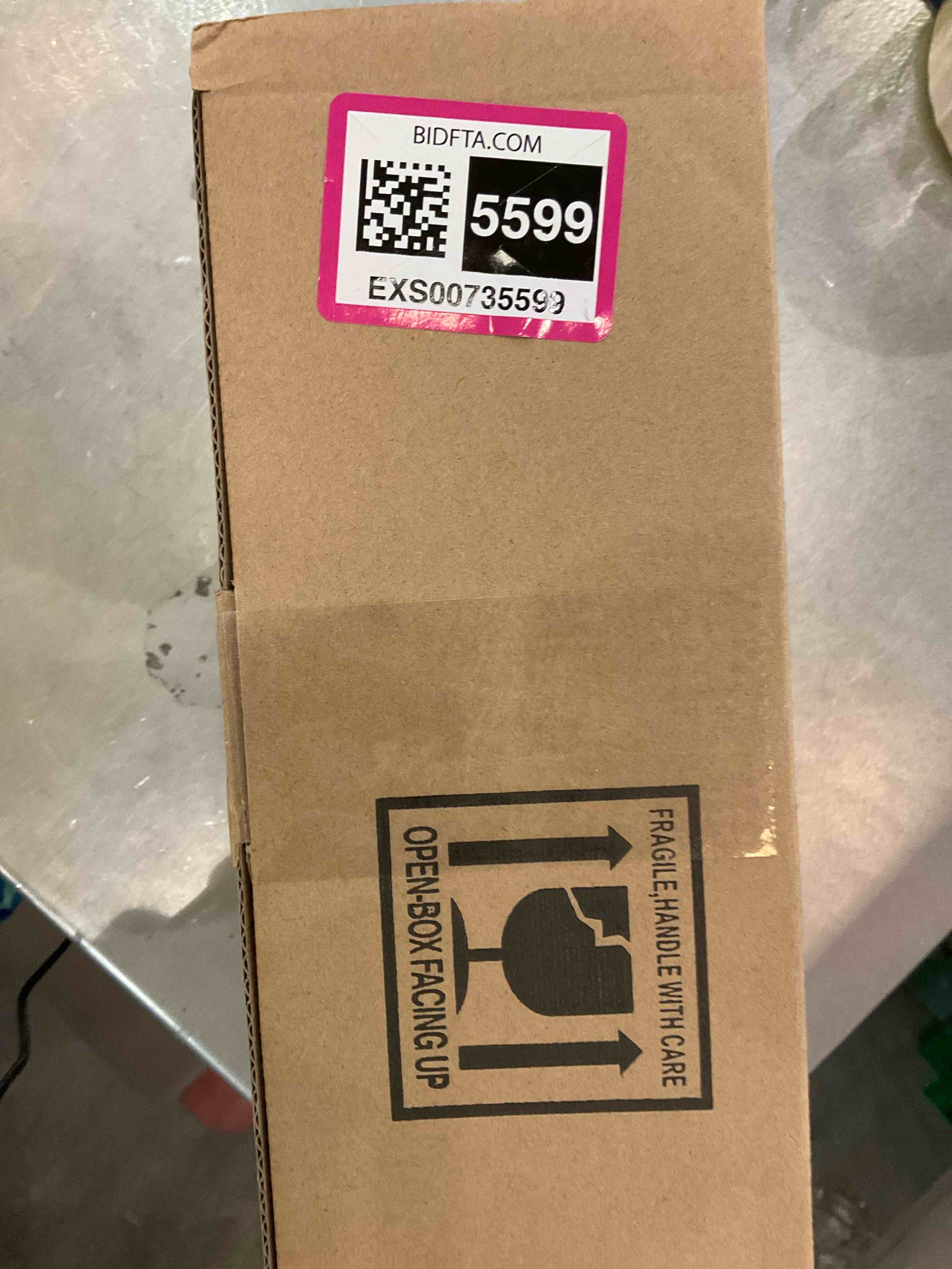 https://s3.amazonaws.com/lotting-images-prod/bidfta/EXS00735599_1702492185809.jpeg