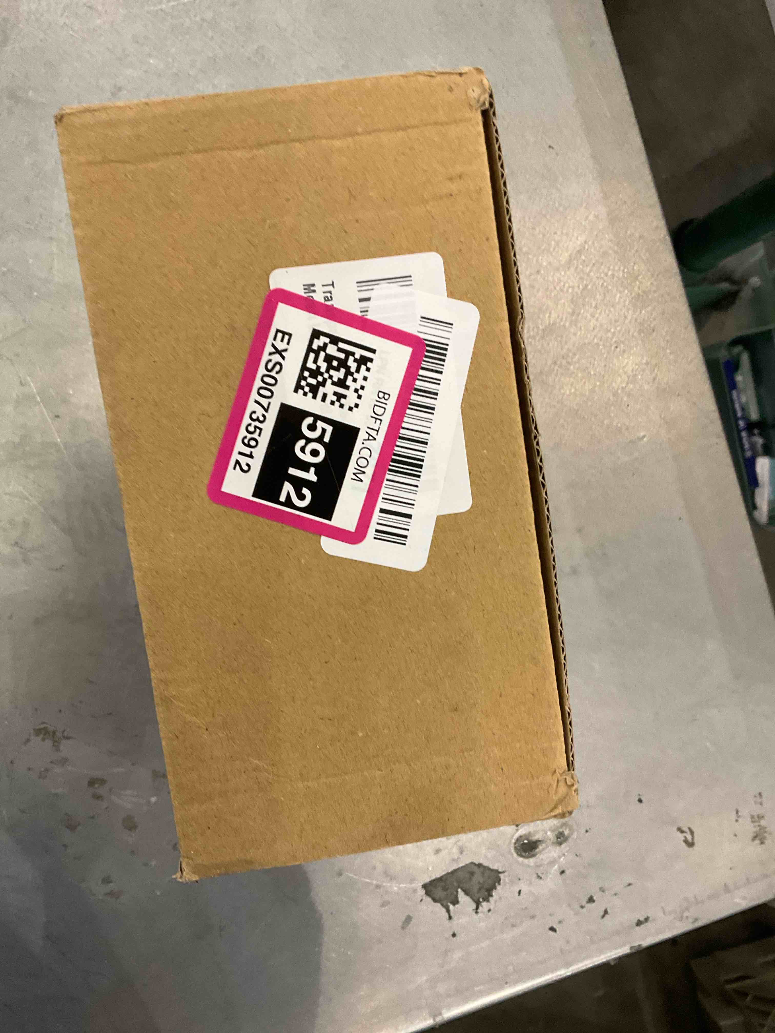 https://s3.amazonaws.com/lotting-images-prod/bidfta/EXS00735912_1702917015202.jpeg