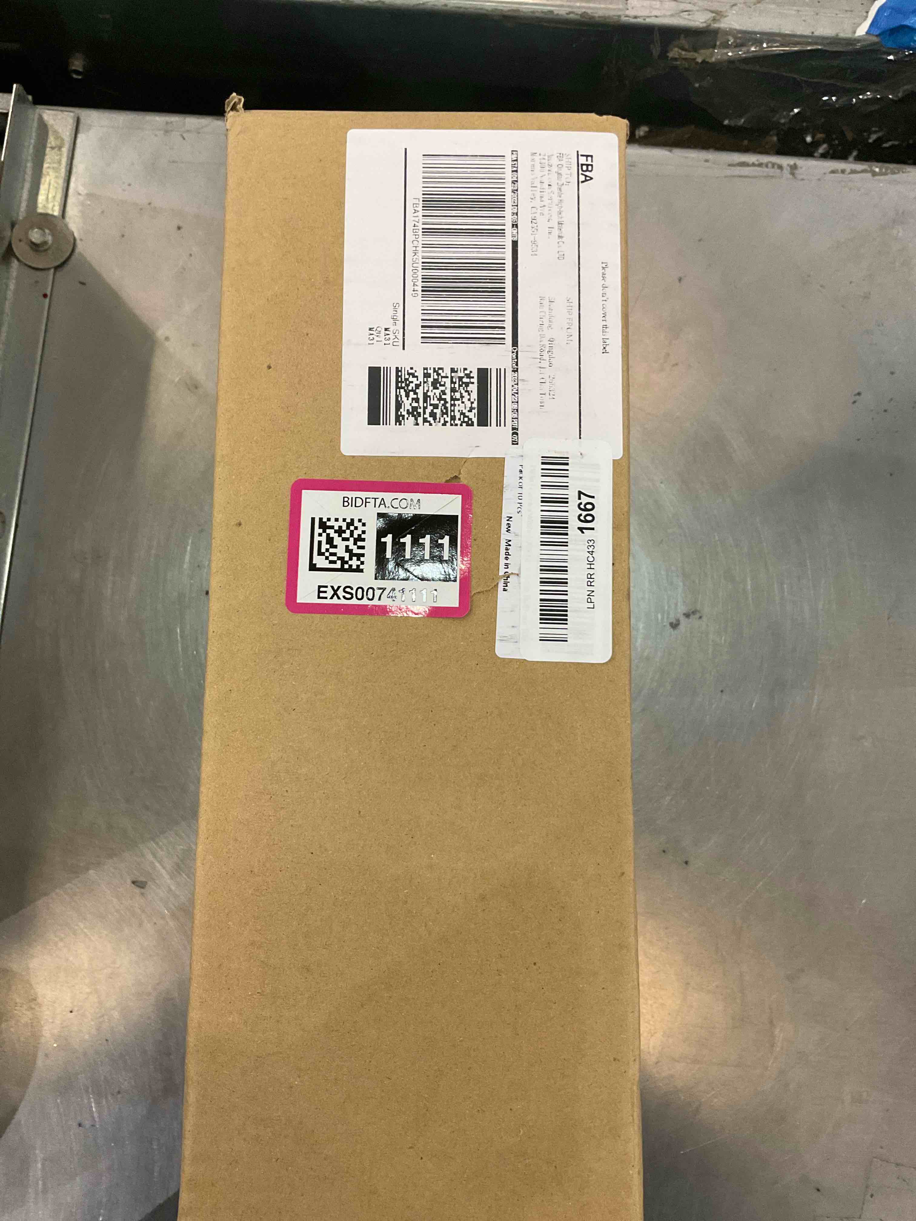 https://s3.amazonaws.com/lotting-images-prod/bidfta/EXS00741111_1702496110903.jpeg