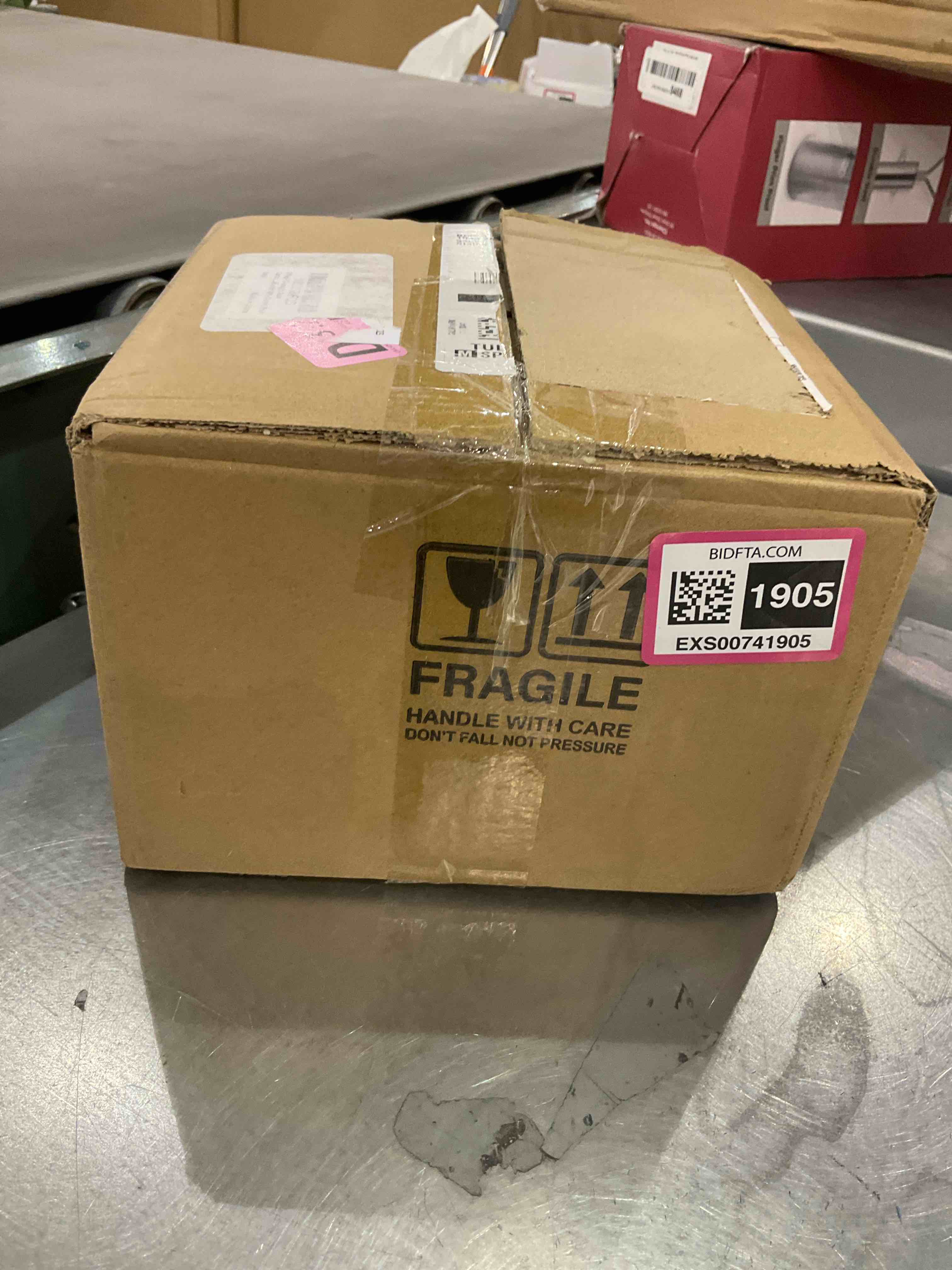 https://s3.amazonaws.com/lotting-images-prod/bidfta/EXS00741905_1705601453784.jpeg