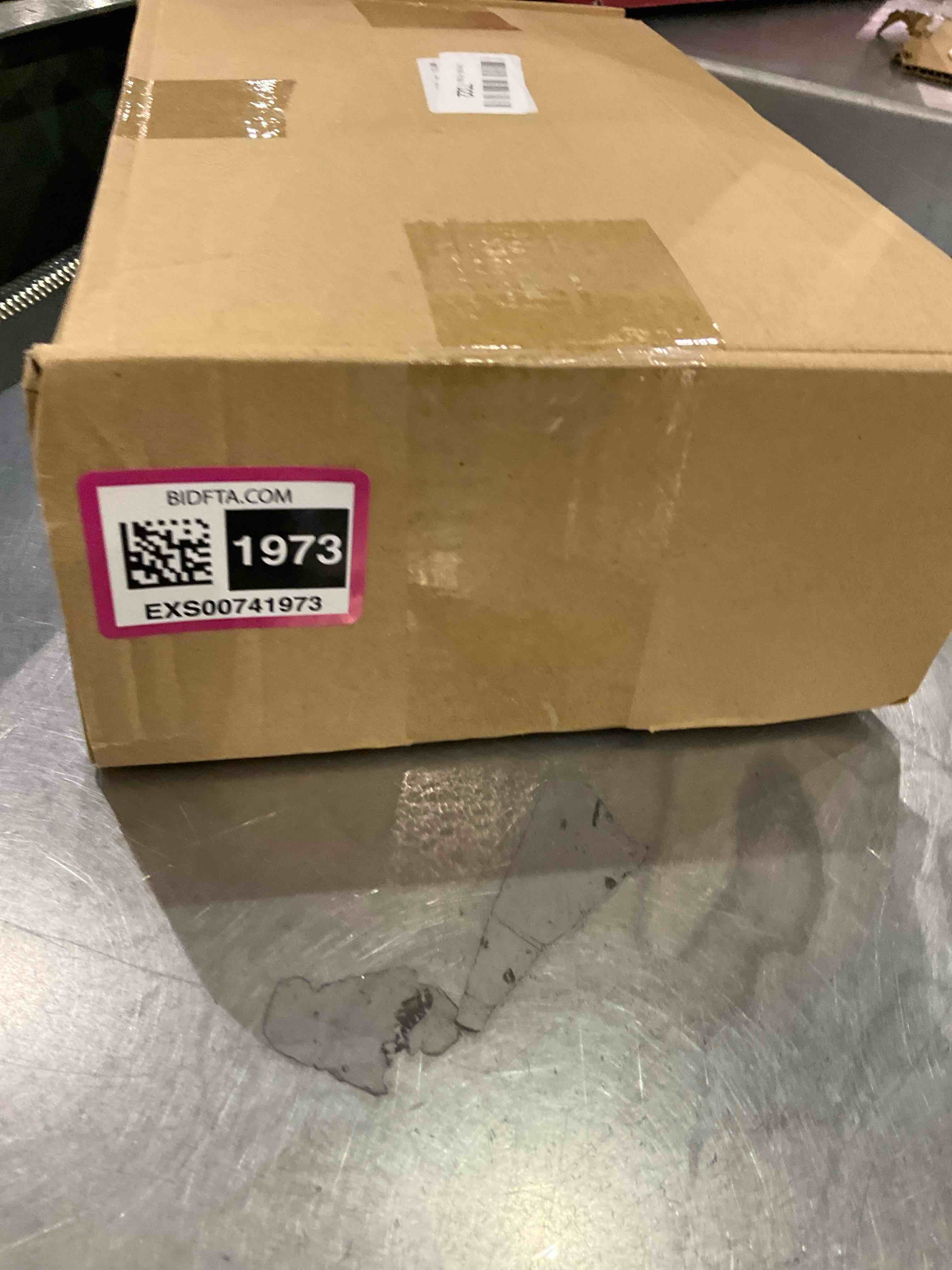 https://s3.amazonaws.com/lotting-images-prod/bidfta/EXS00741973_1705675990185.jpeg