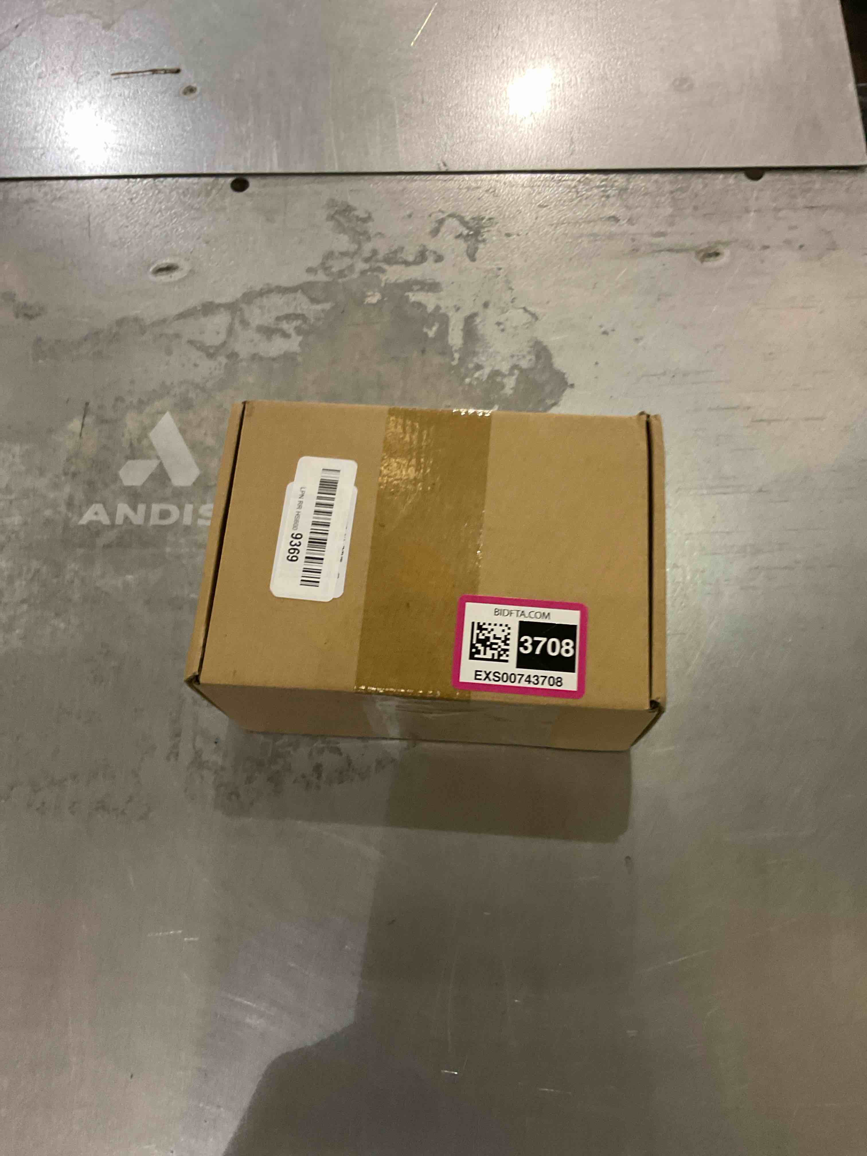 https://s3.amazonaws.com/lotting-images-prod/bidfta/EXS00743708_1702478081326.jpeg