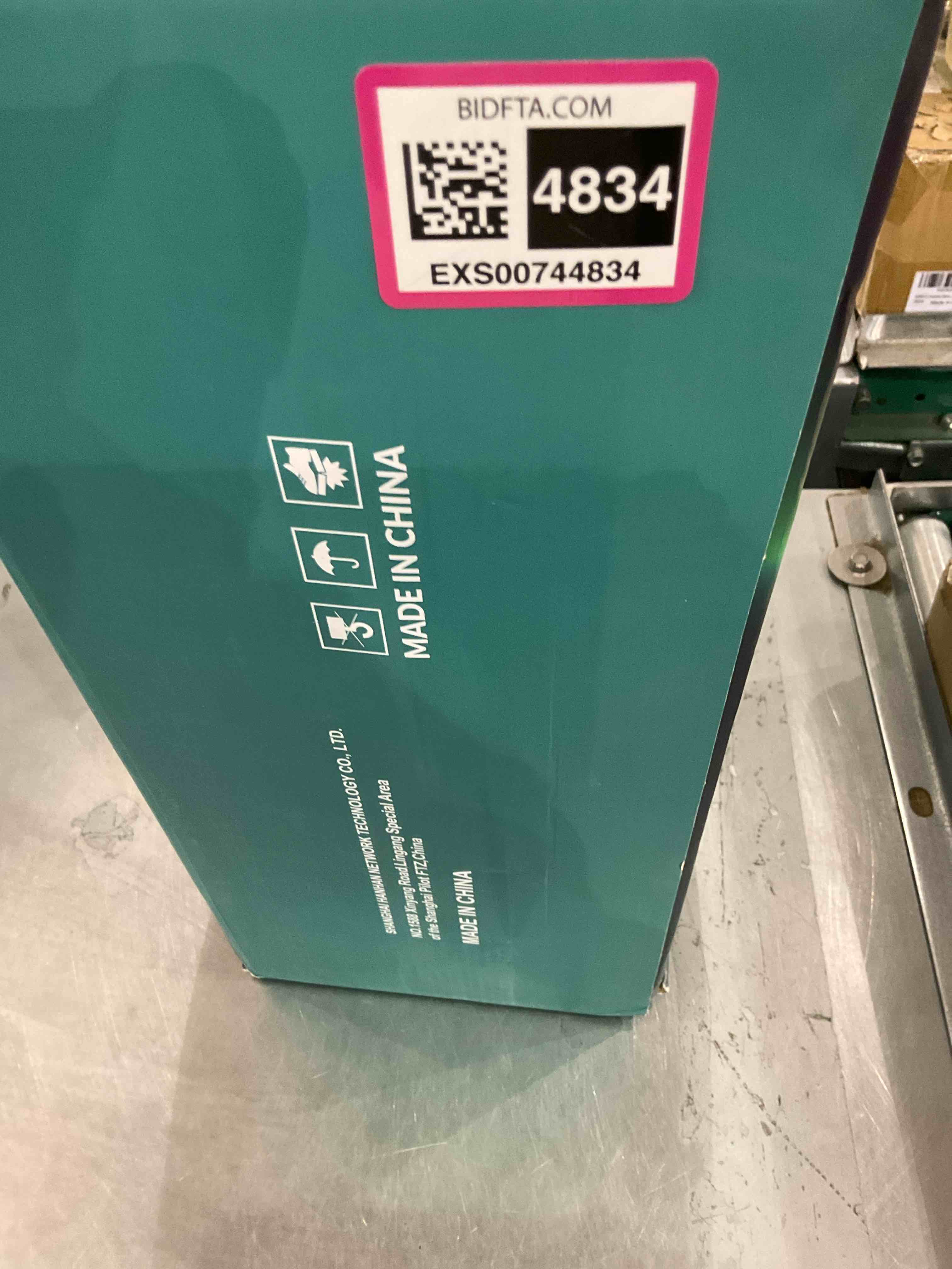 https://s3.amazonaws.com/lotting-images-prod/bidfta/EXS00744834_1702559083189.jpeg